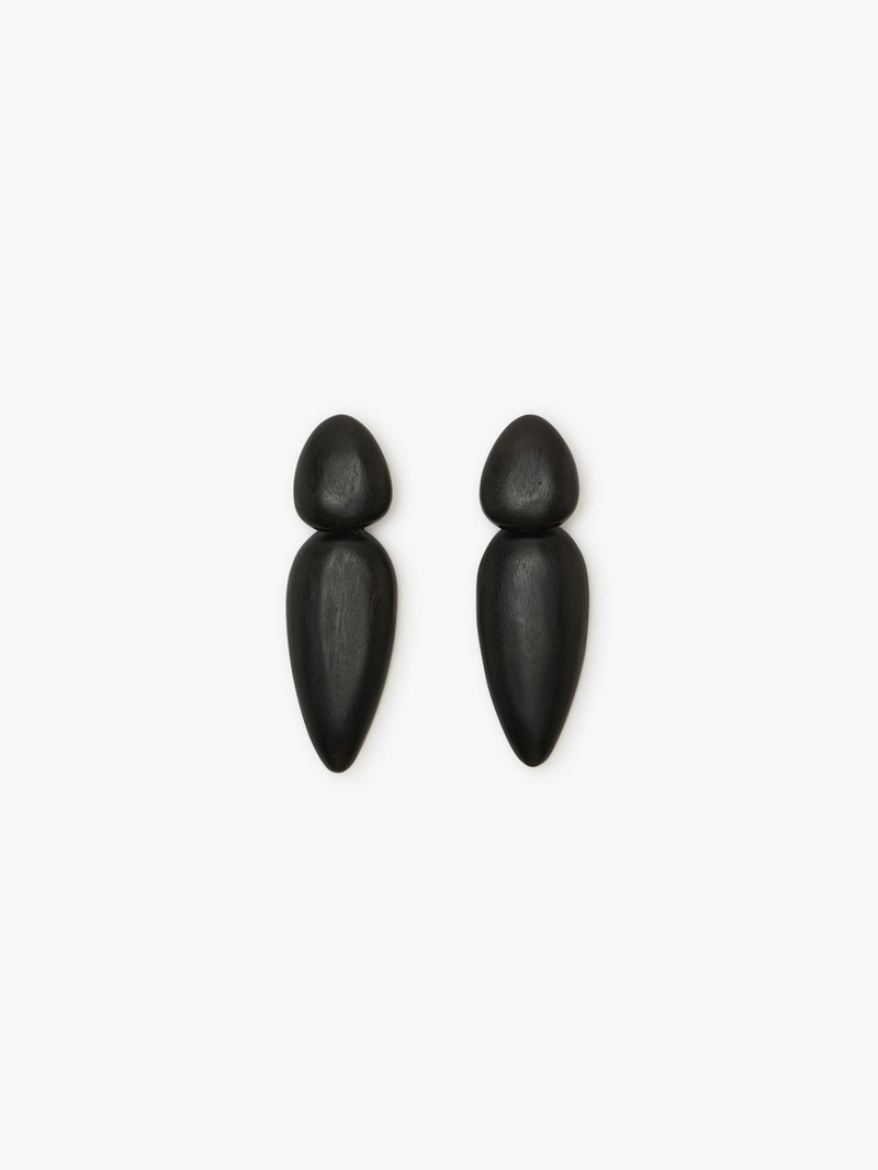 A pair of black acacia earrings with a silver plated brass clip, presented against a white background.