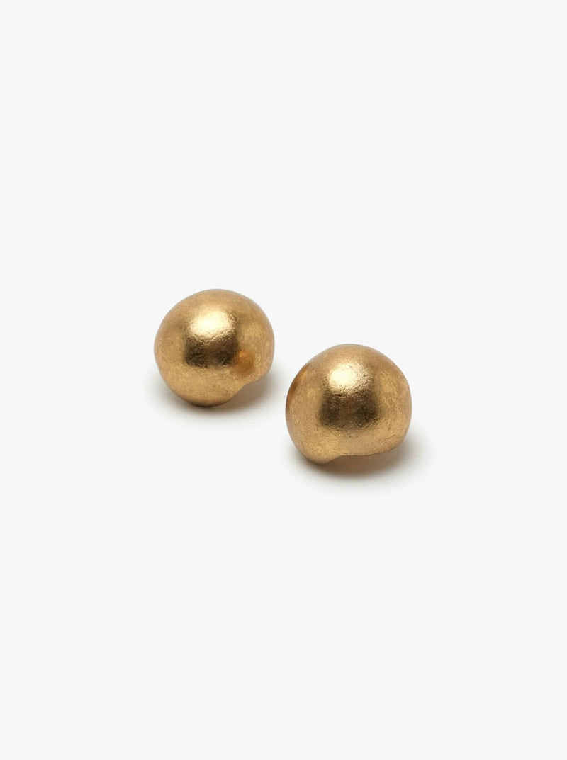 A pair of gold-colored earclips with a gold foil finish on a white background.