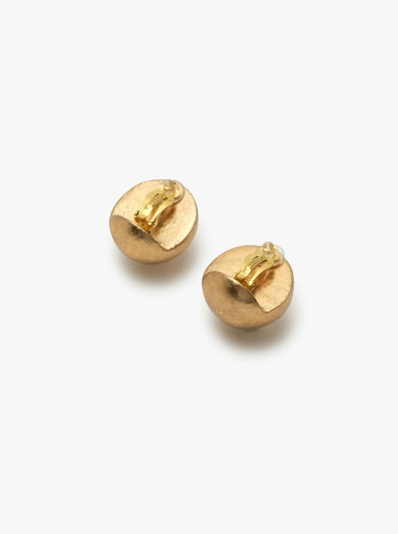 A pair of gold-colored earclips with a gold foil finish on a white background.
