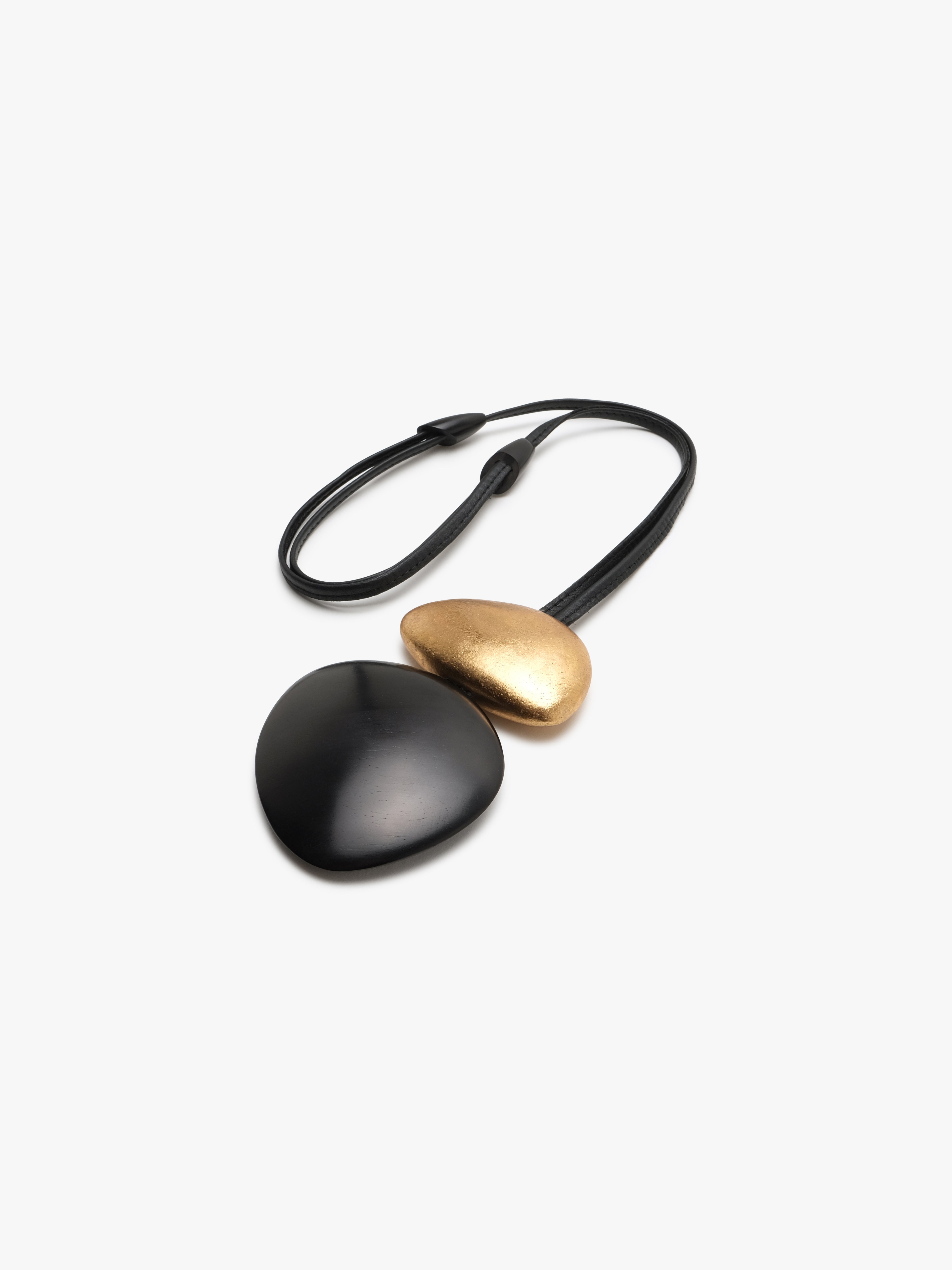 Akita pendant: acacia, goldfoil, leather