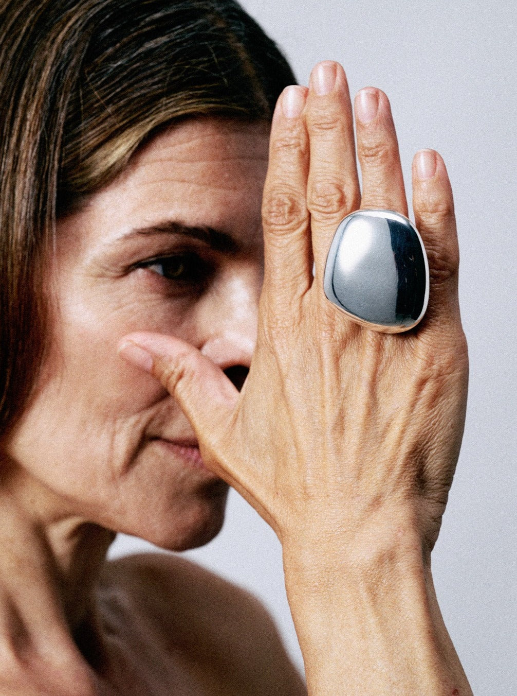 Anniversary ring: sterling silver, beige leather