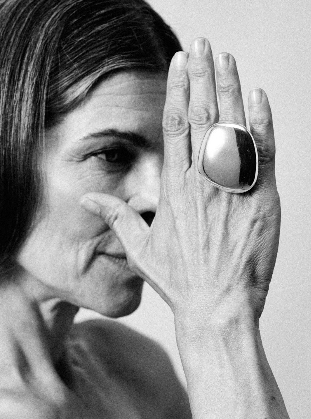 Anniversary ring: sterling silver, beige leather