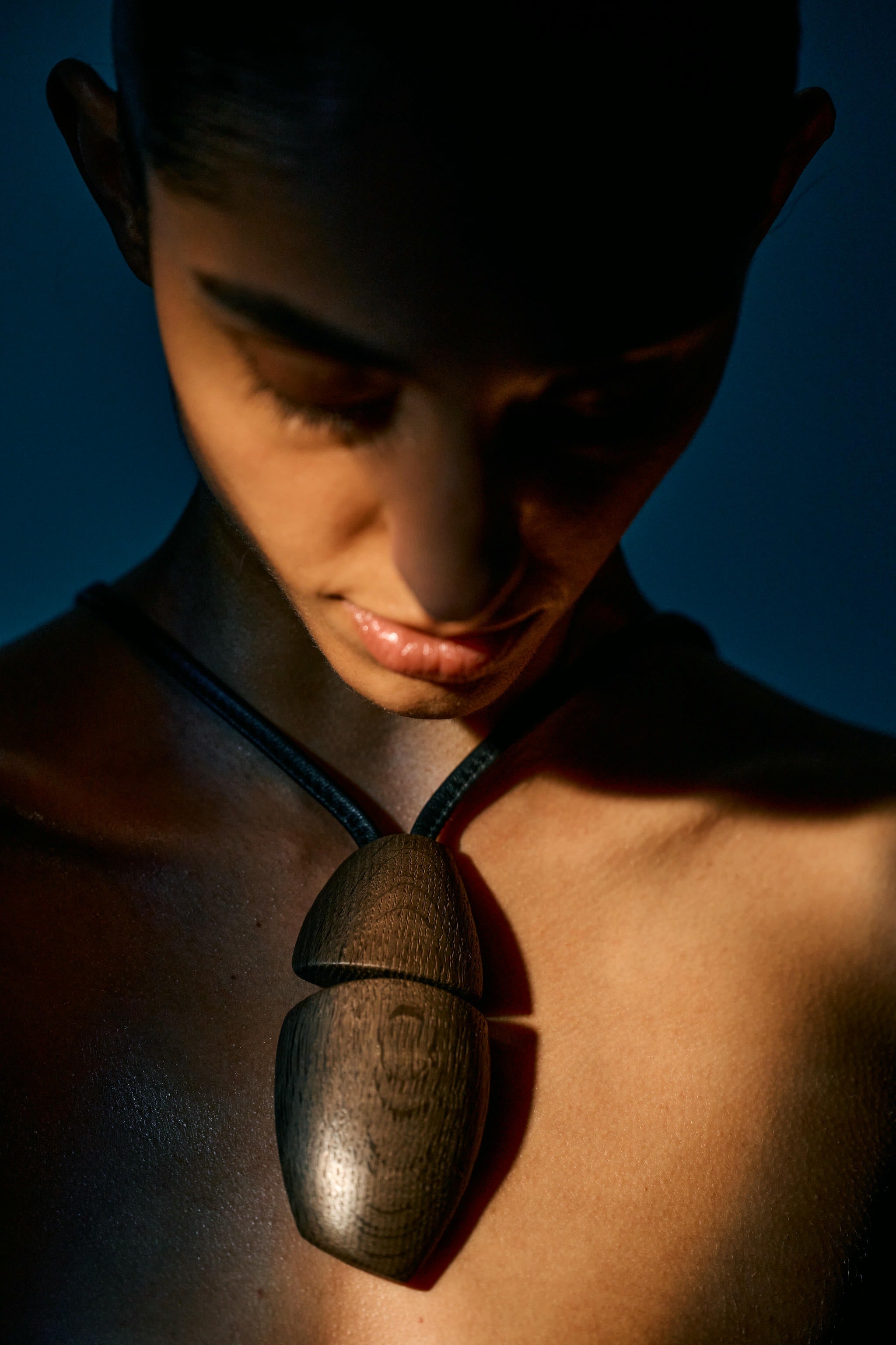 Lira pendant: bog oak, leather