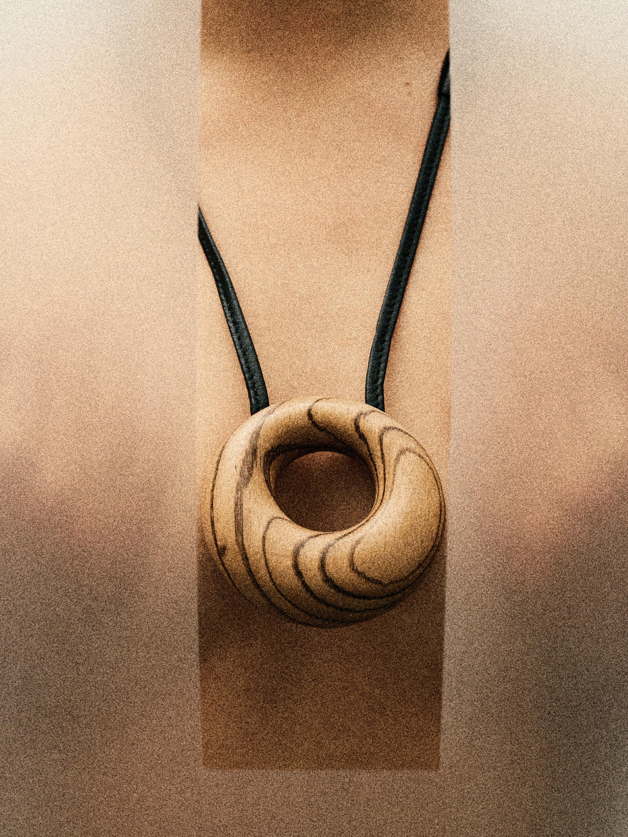 Vala pendant: zebrano wood, leather