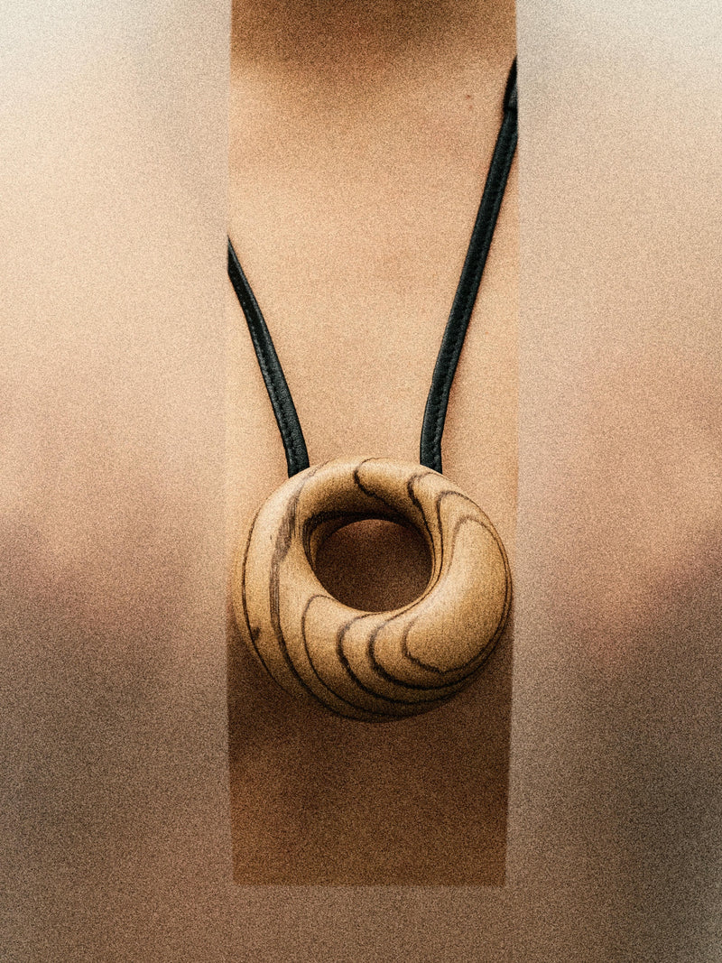 Vala pendant: zebrano wood, leather