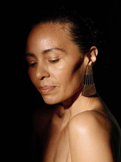 Bolira earrings:  bog oak, leather