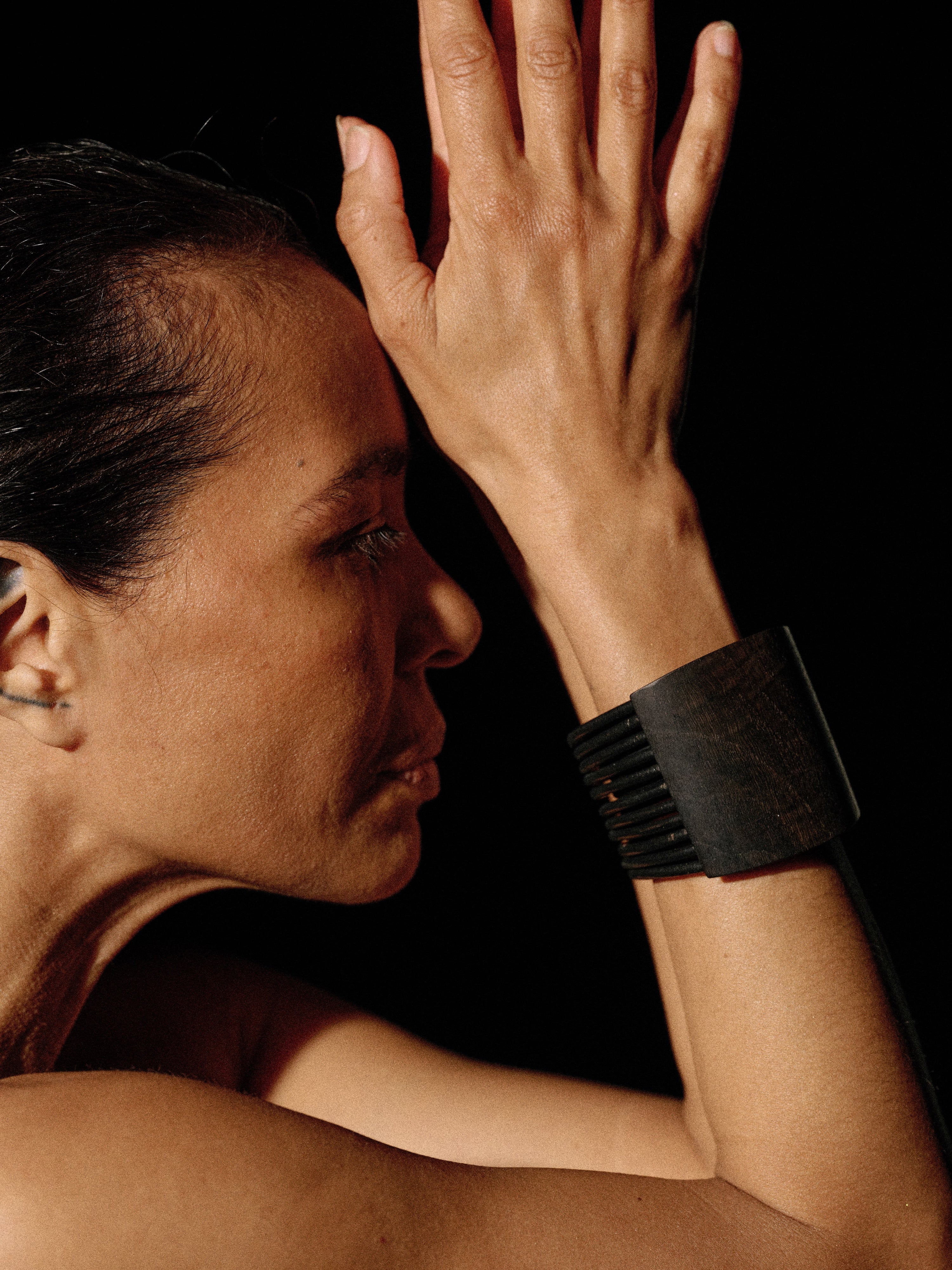 Bellara bracelet: bog oak, leather