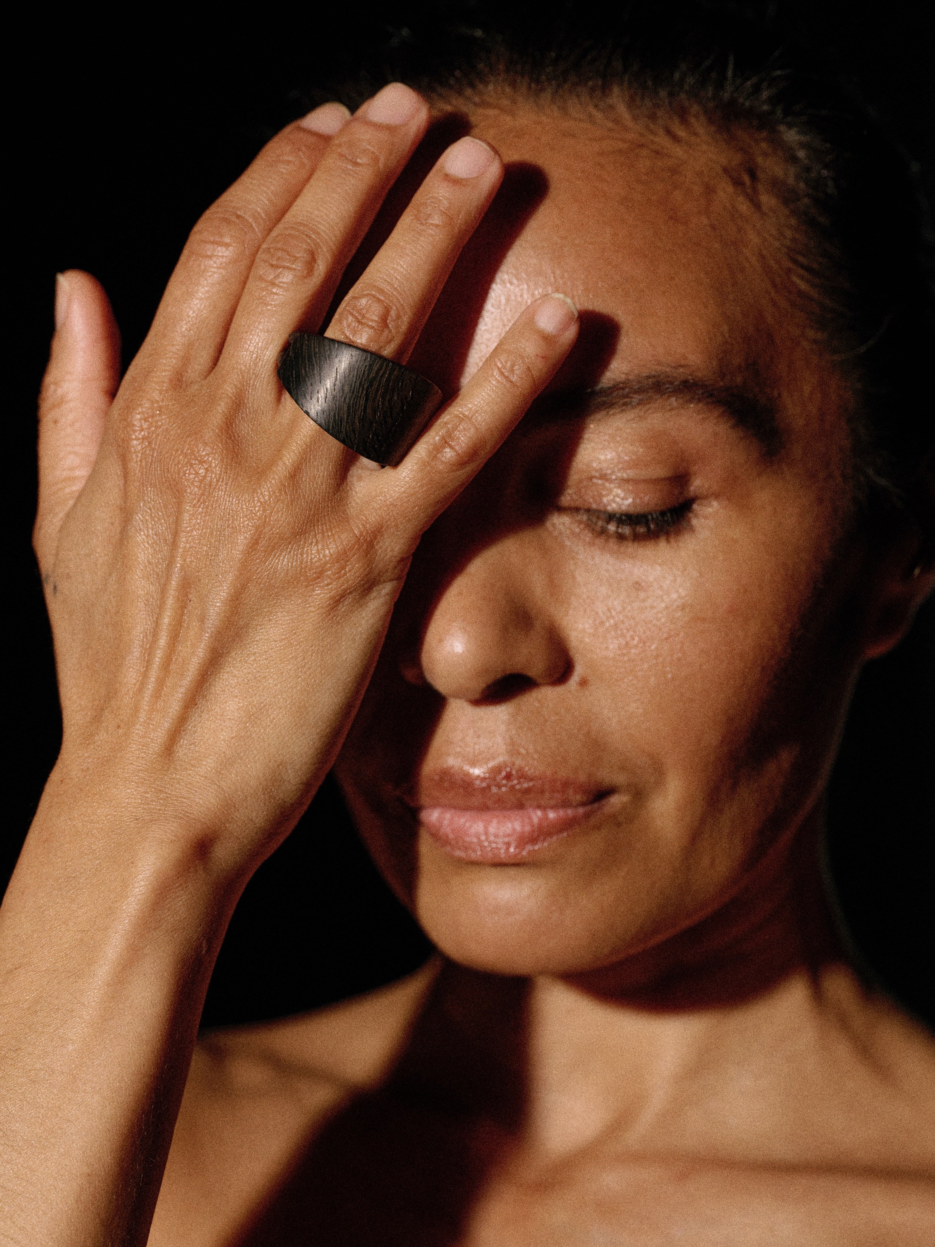 Brontea ring: bog oak, leather