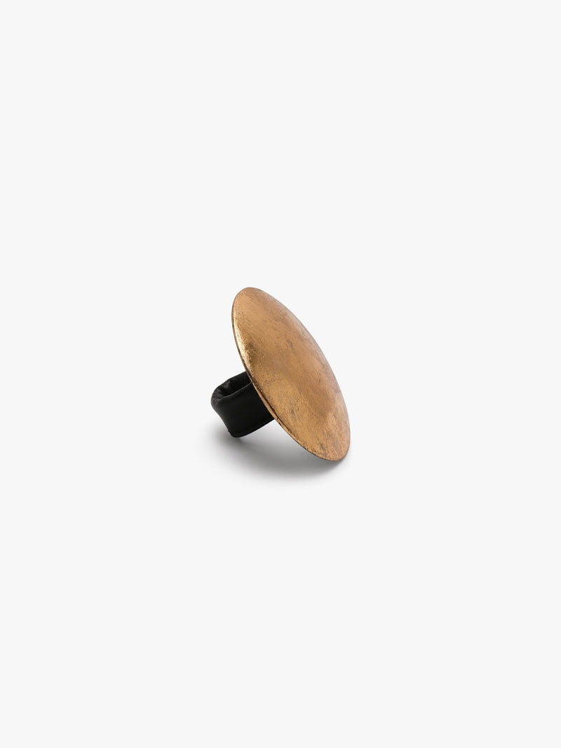 large goldfoil ring on white background