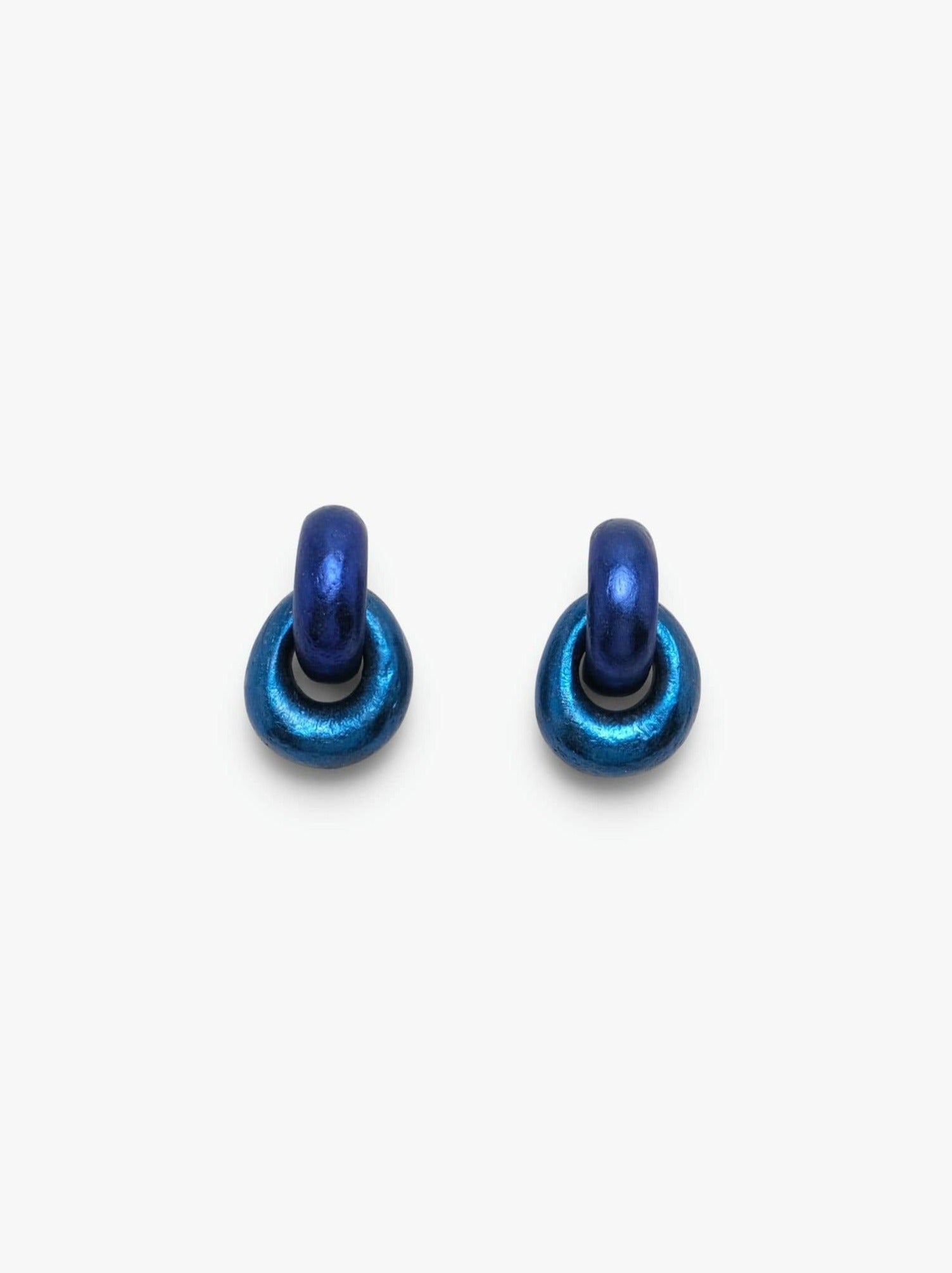 Astra earclips: blue foil, acacia