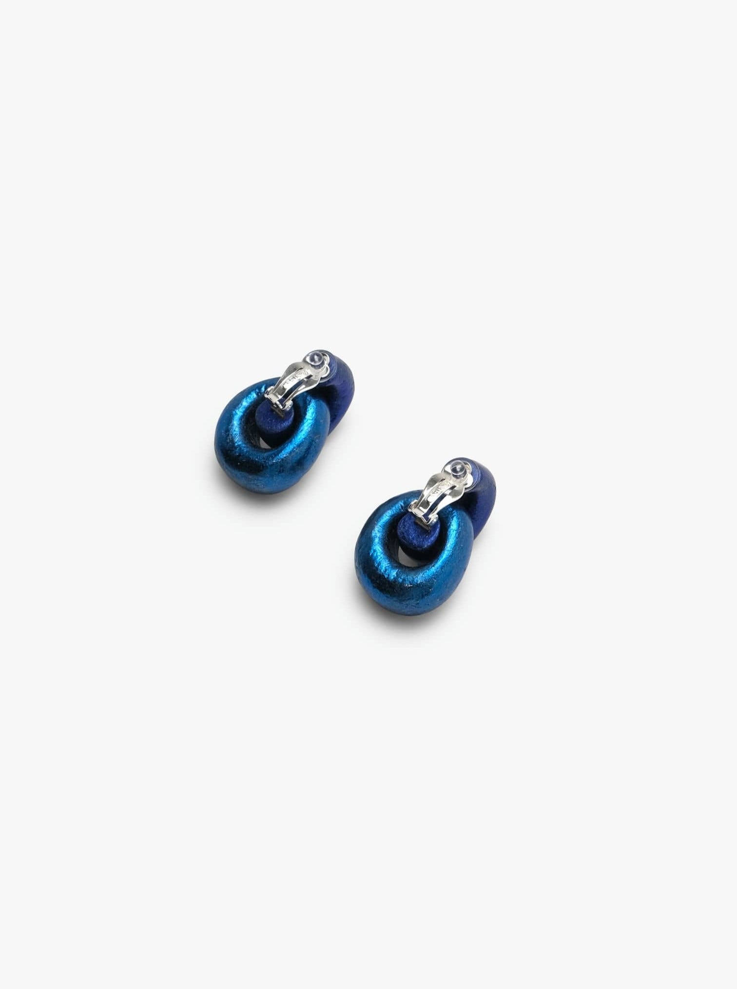 Astra earclips: blue foil, acacia