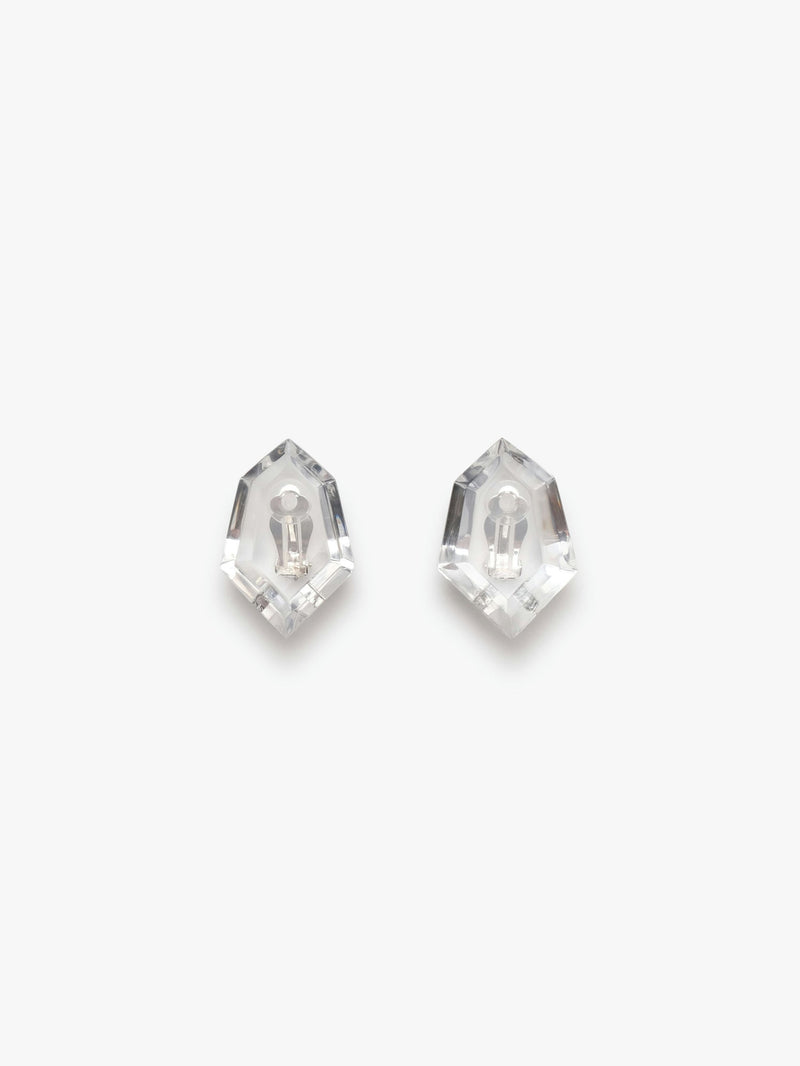A pair of transparent acrylic earrings with a geometric shape, attached to silver plated brass ear clips.