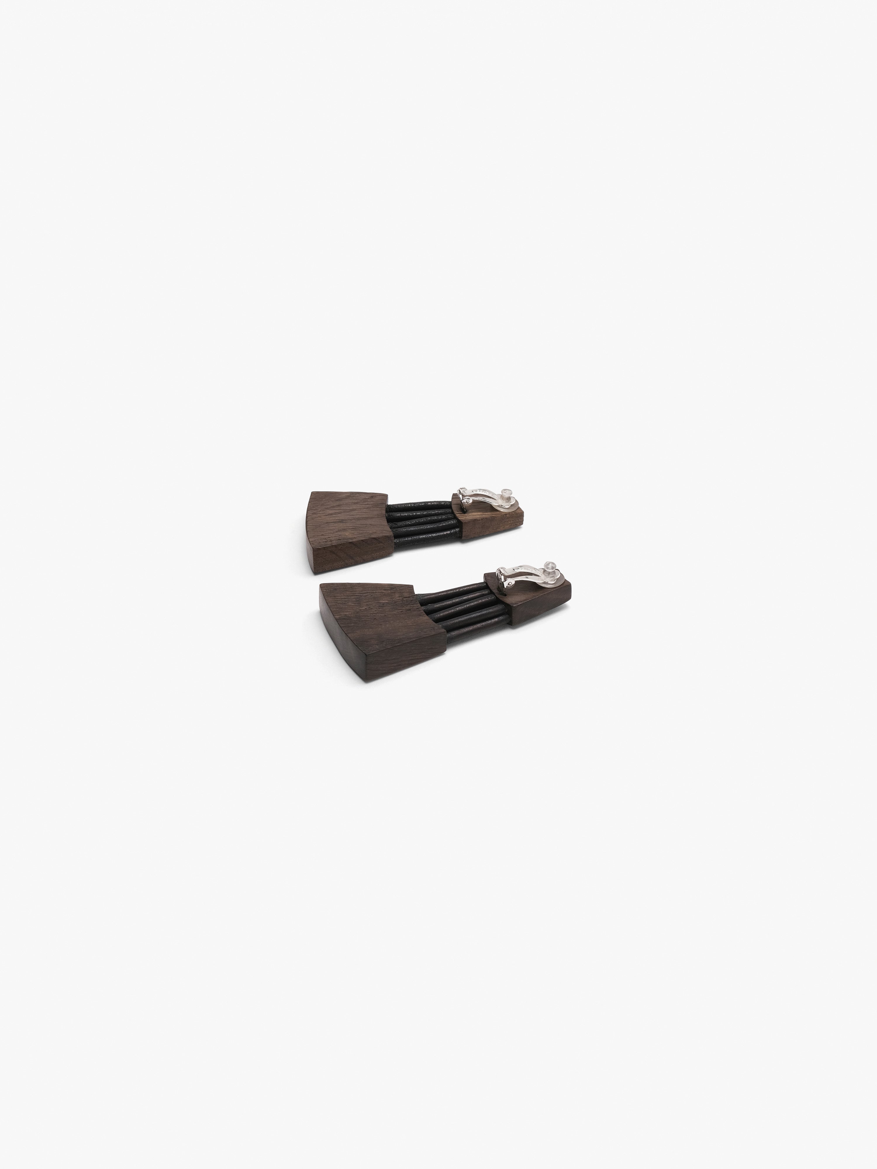Bolira earrings:  bog oak, leather