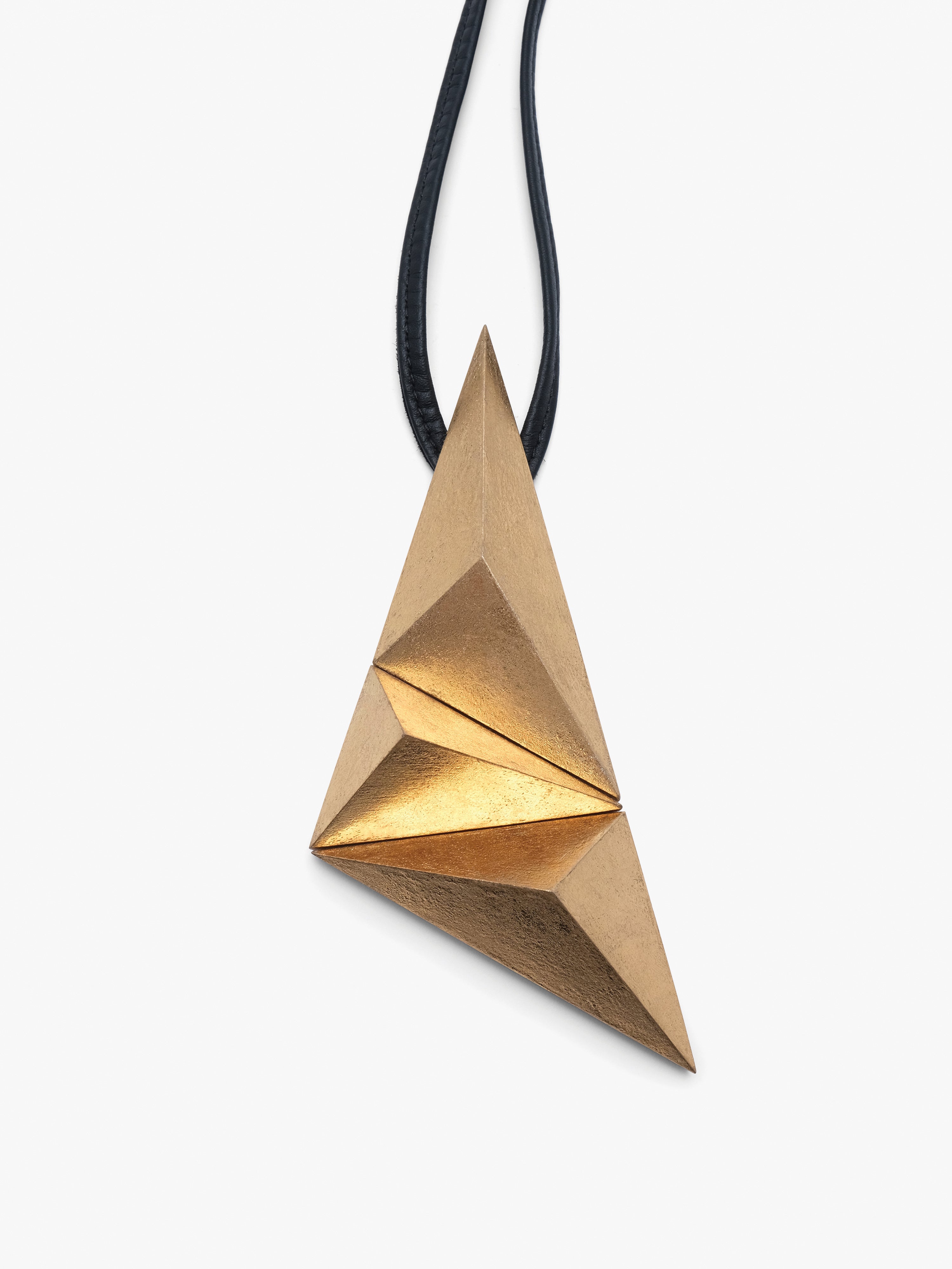 Greya pendant: acacia, goldfoil, leather