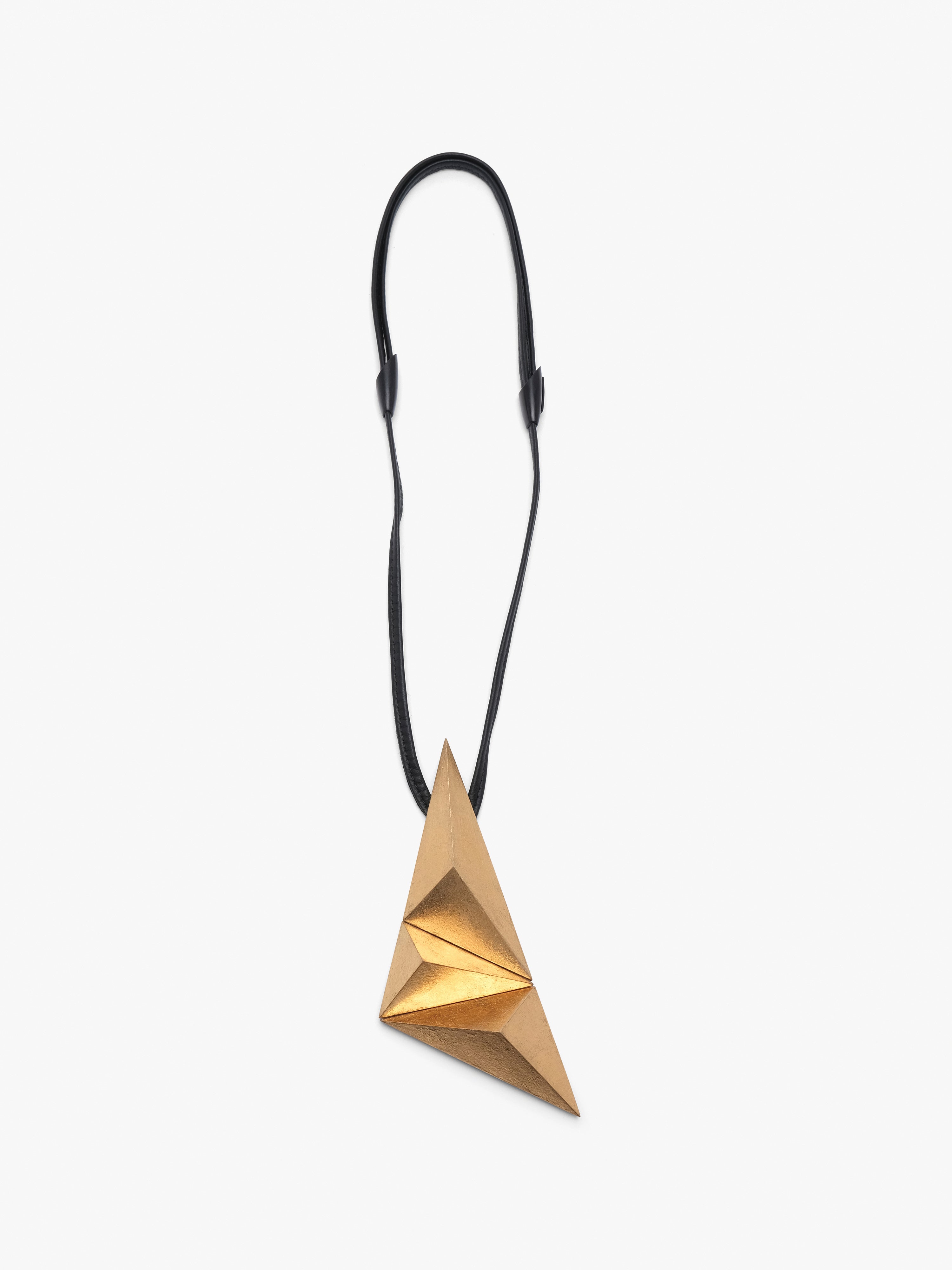 Greya pendant: acacia, goldfoil, leather