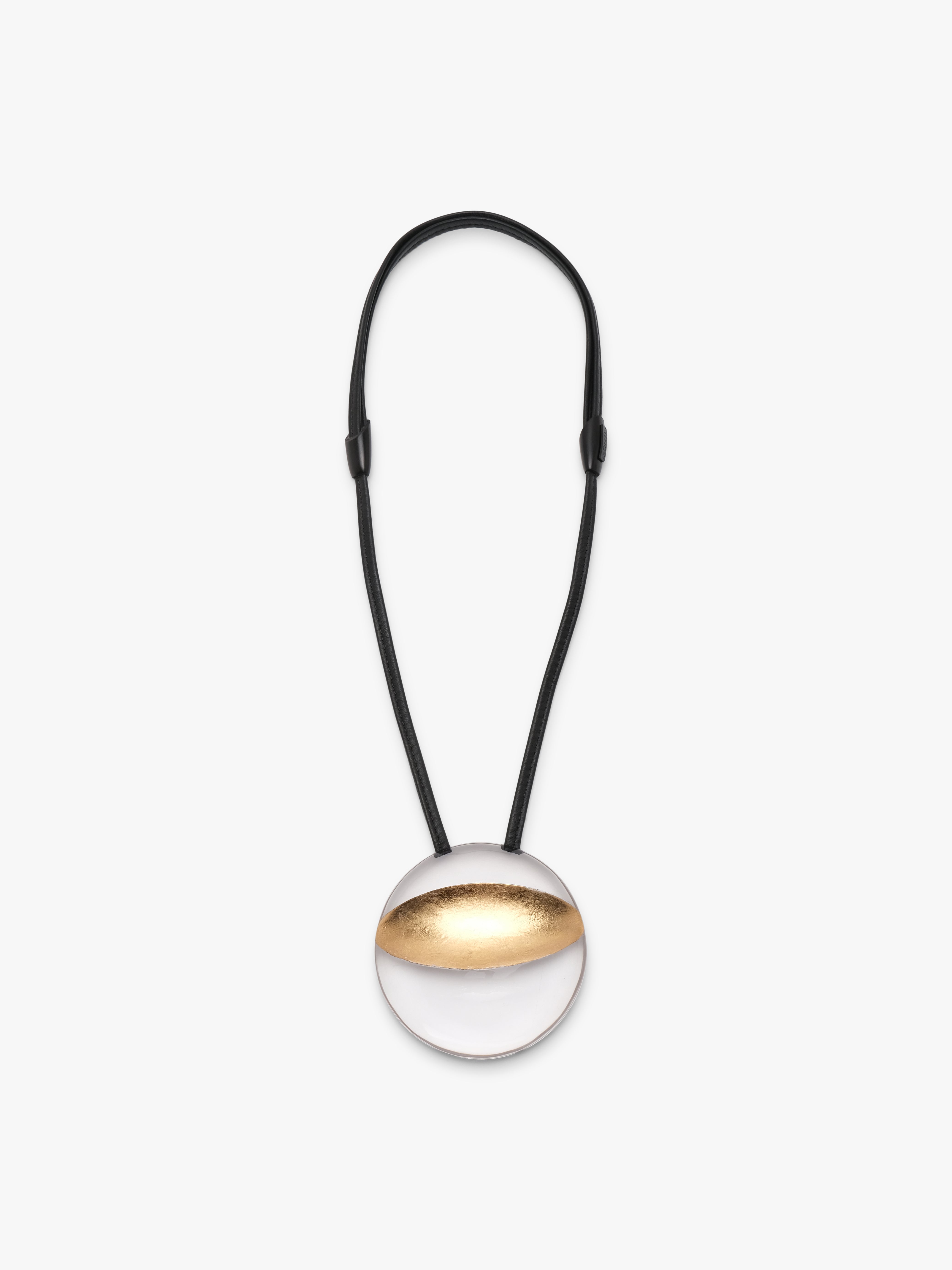 Isola pendant: greencast acrylic, leather, goldfoil