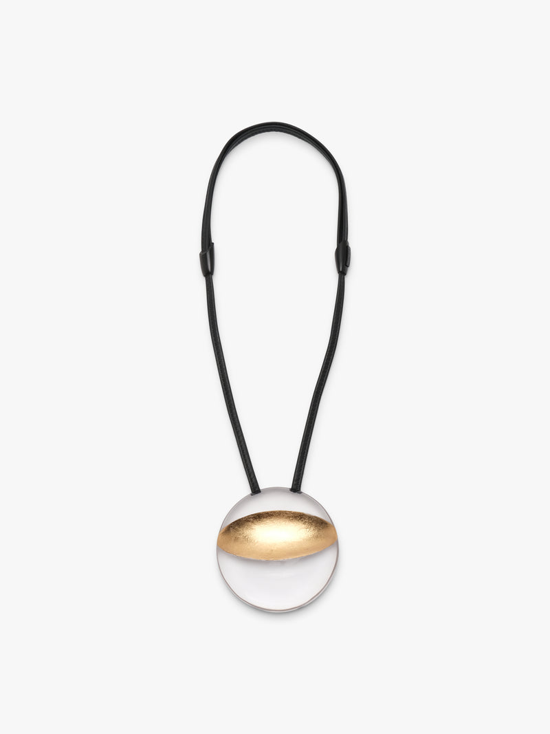 Isola pendant: greencast acrylic, leather, goldfoil