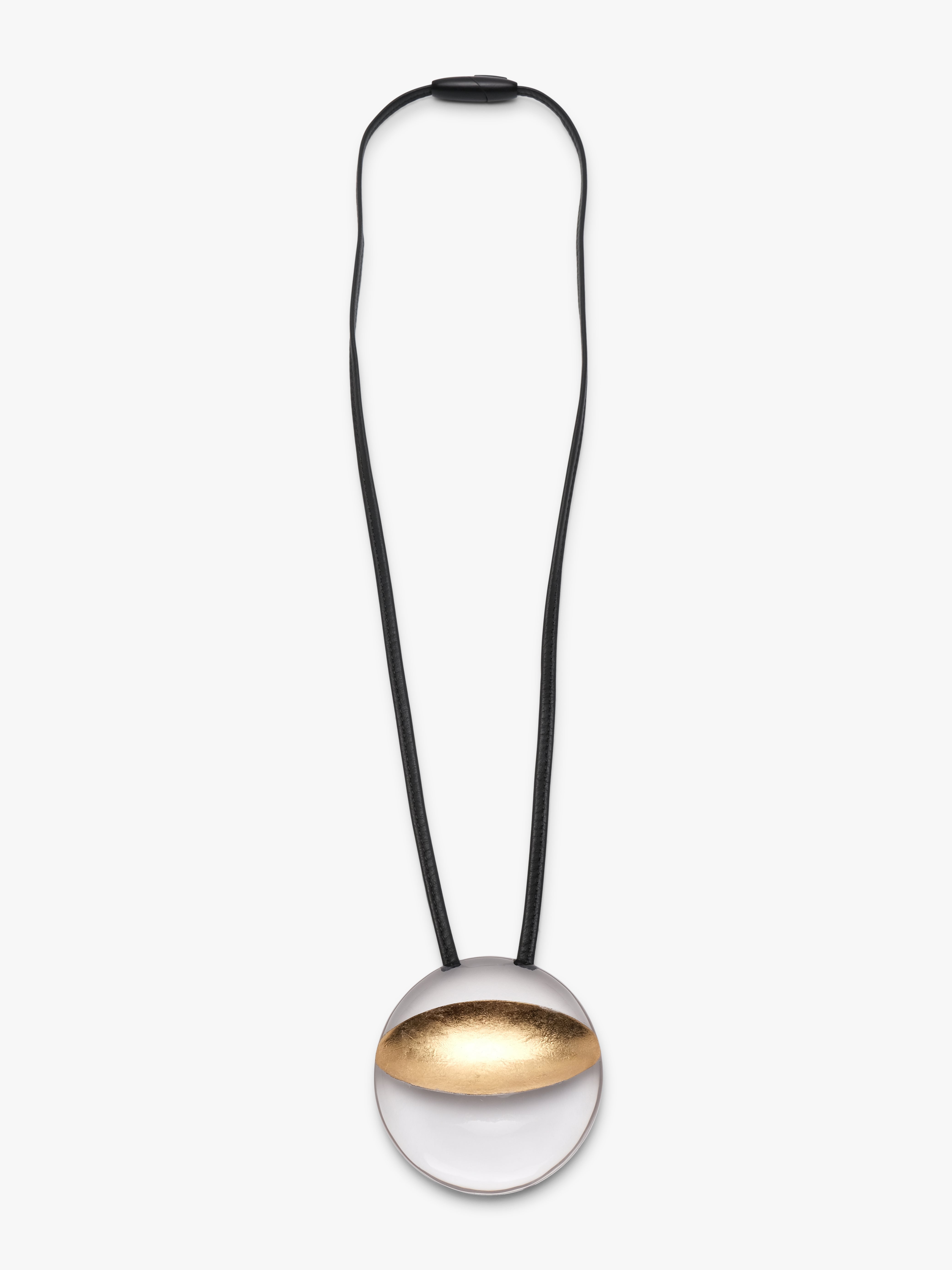 Isola pendant: greencast acrylic, leather, goldfoil