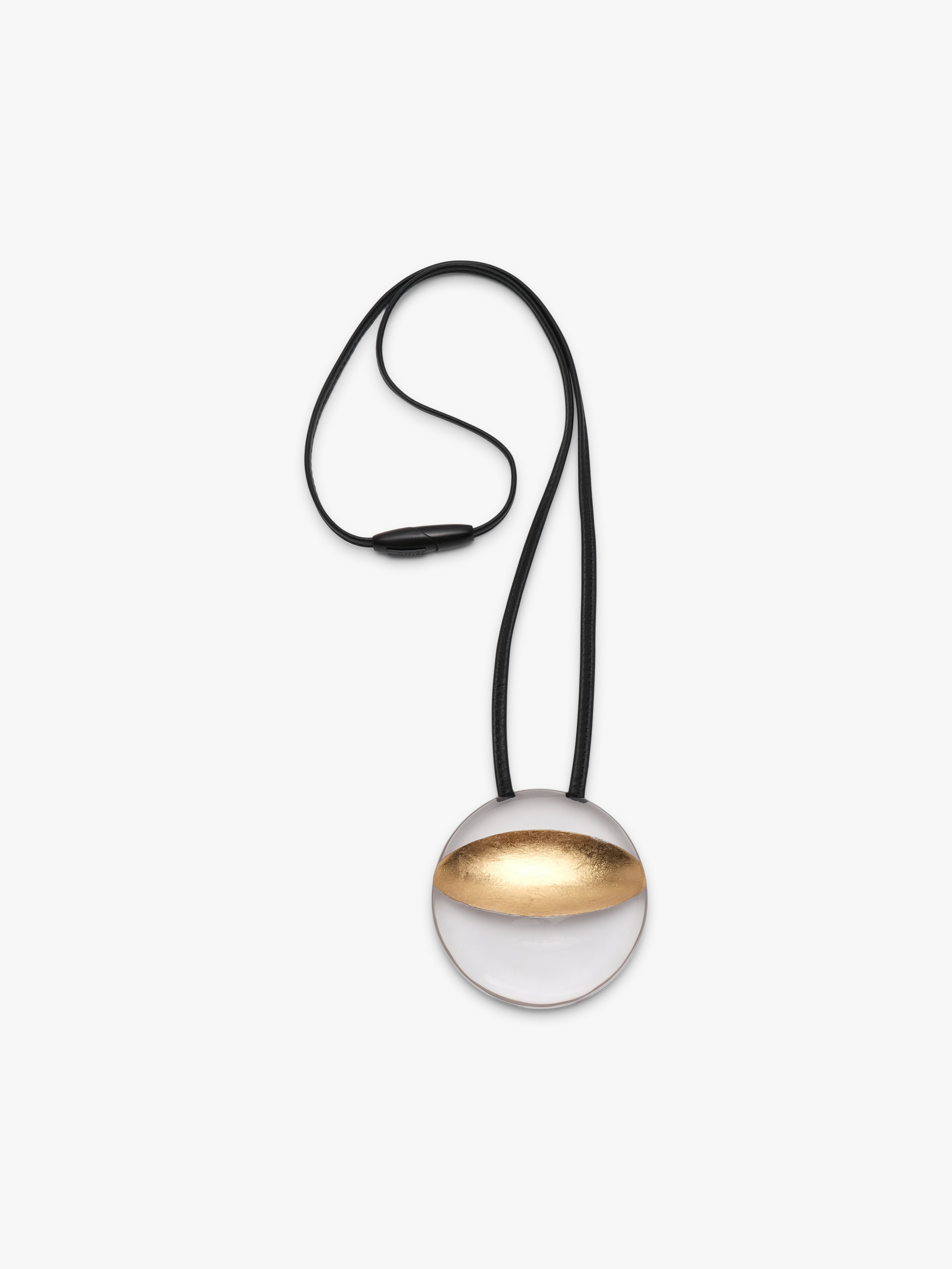 Isola pendant: greencast acrylic, leather, goldfoil