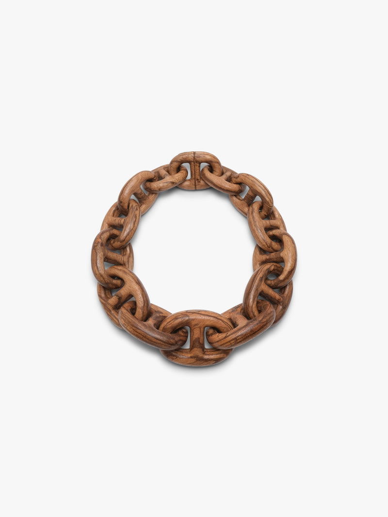 Brown chain wood necklace on a white background