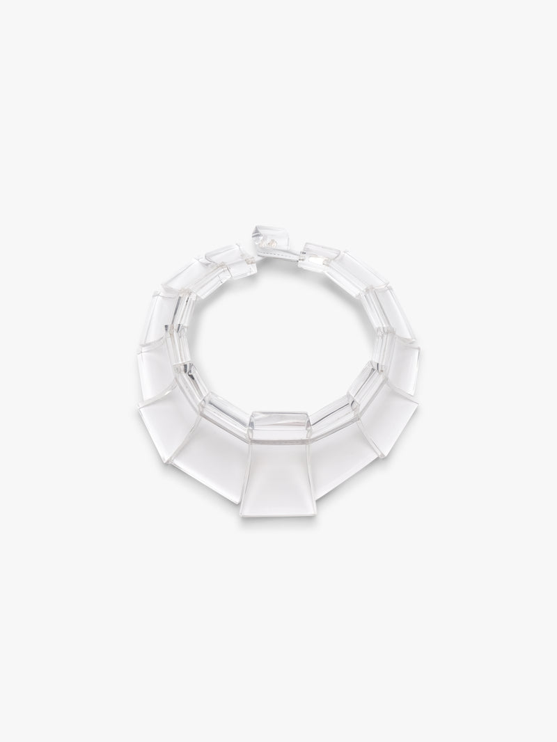 Clear acrylic necklace on a white background