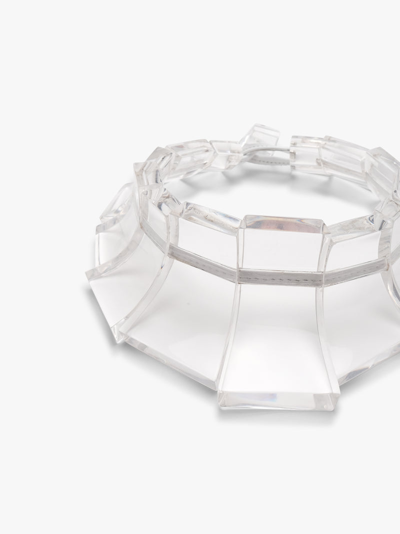 Clear acrylic necklace on a white background