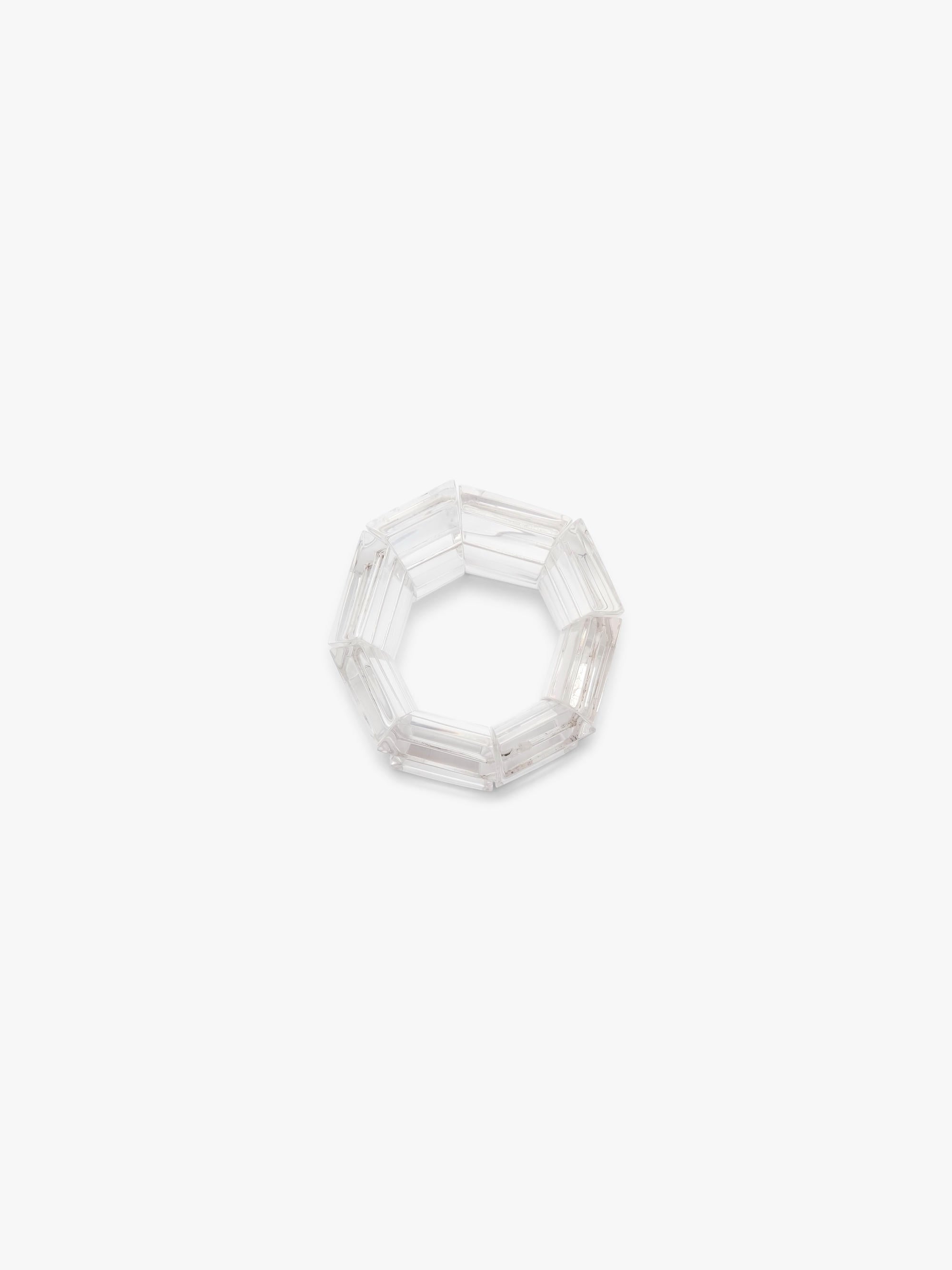 Transparent geometric bracelet on a white background