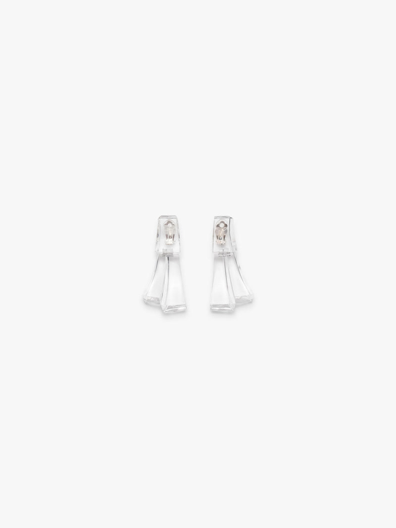 Pair of transparent earrings on a white background