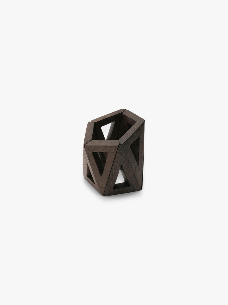 A dark brown geometric wooden bracelet with triangular cutouts, photographed on a clean white background.