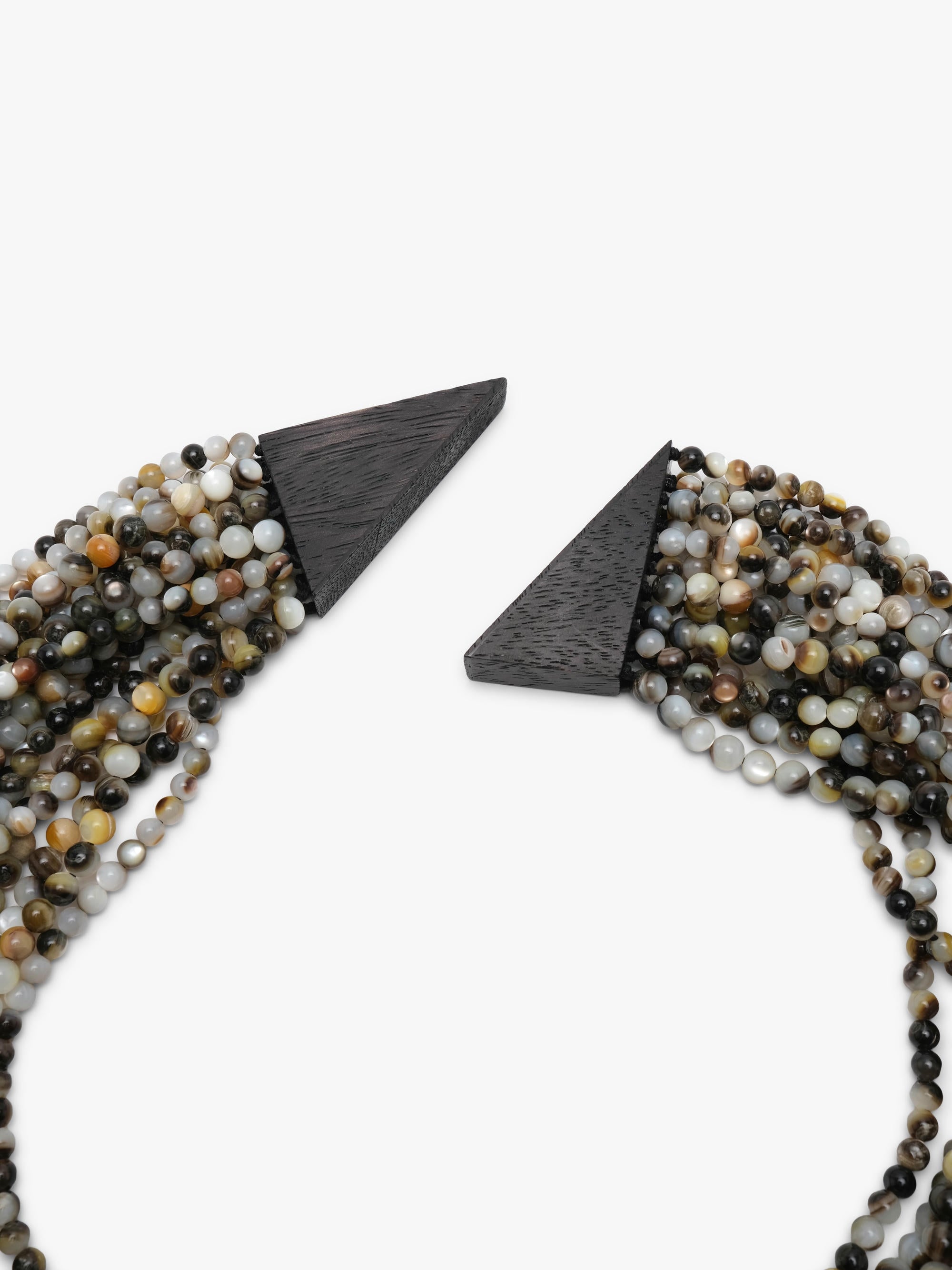 A multi-strand beaded pearl necklace with a dark brown geometric clasp, displayed on a clean white background.