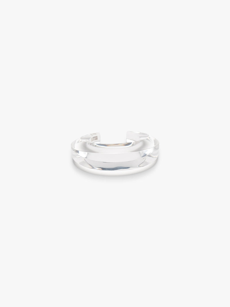 transparent curved bracelet, displayed on a white background