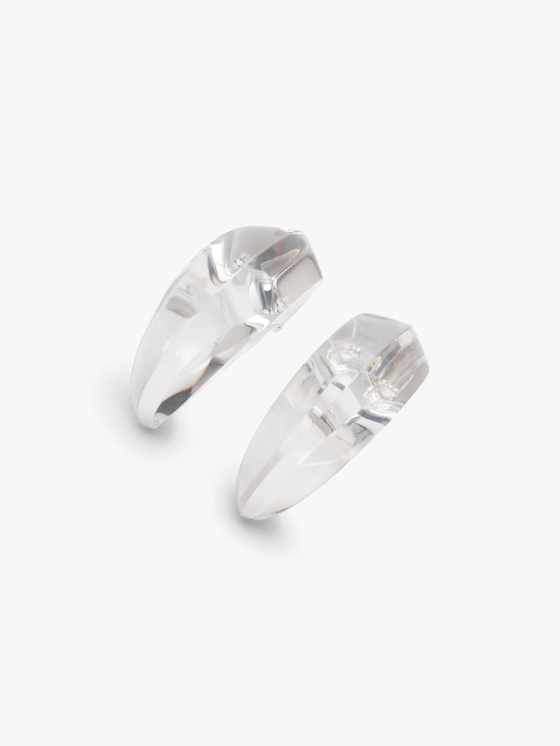 transparent curved earrings displayed on a white background