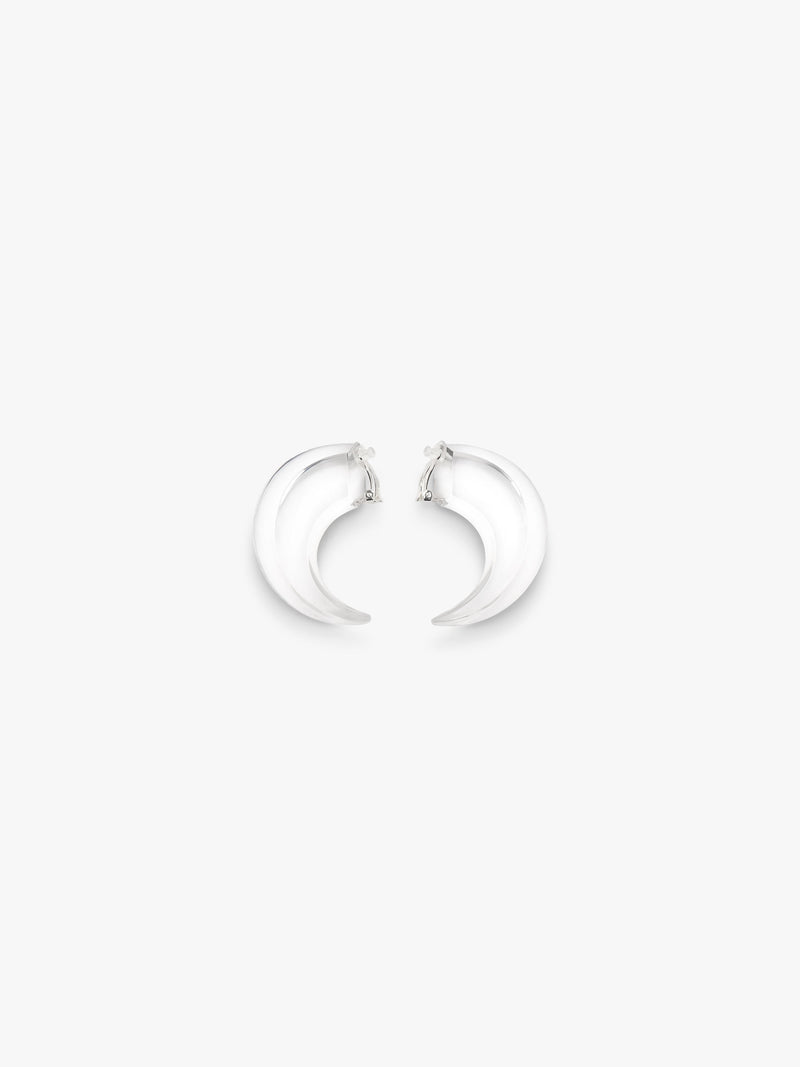transparent curved earrings displayed on a white background