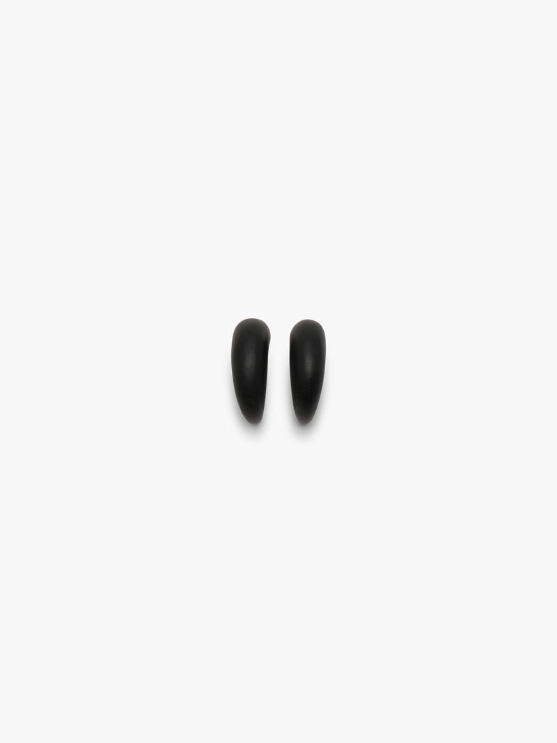A pair of matte black earrings shown against a solid white background.