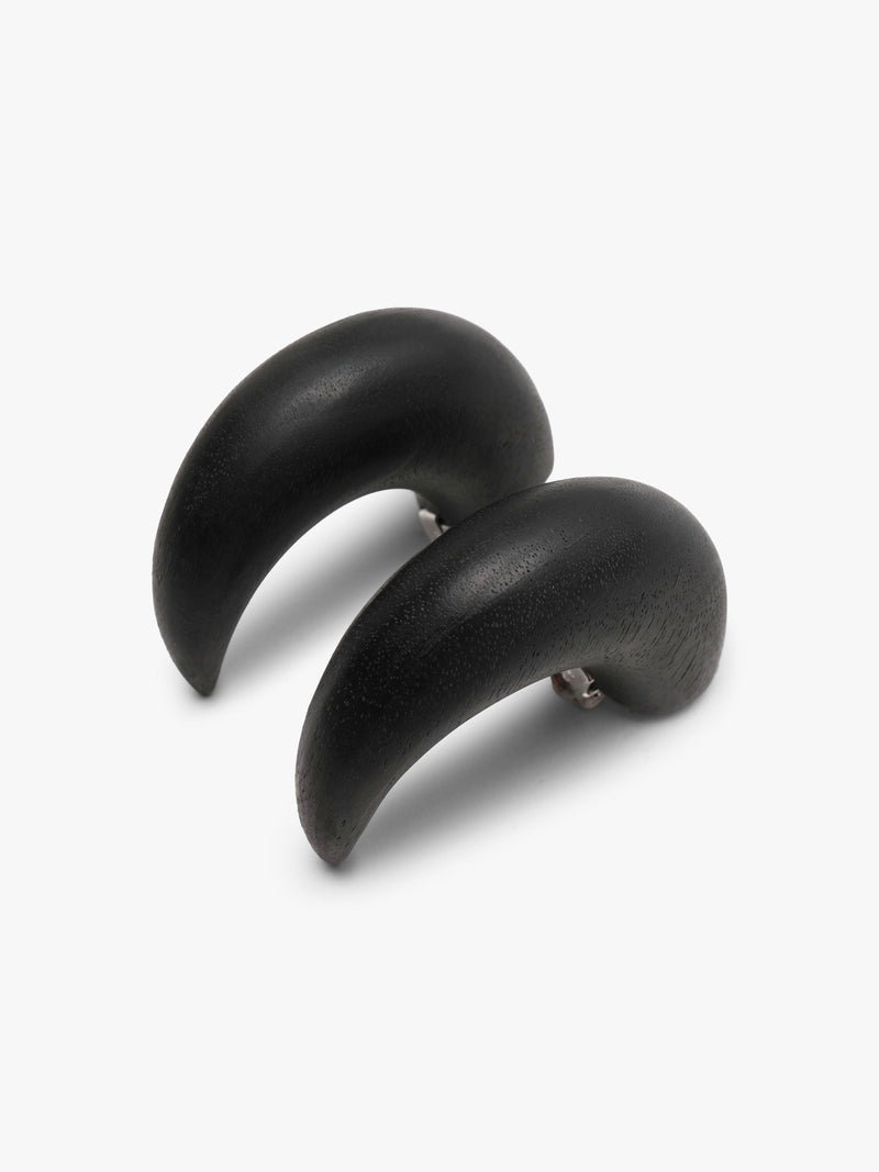 A pair of matte black earrings shown against a solid white background.