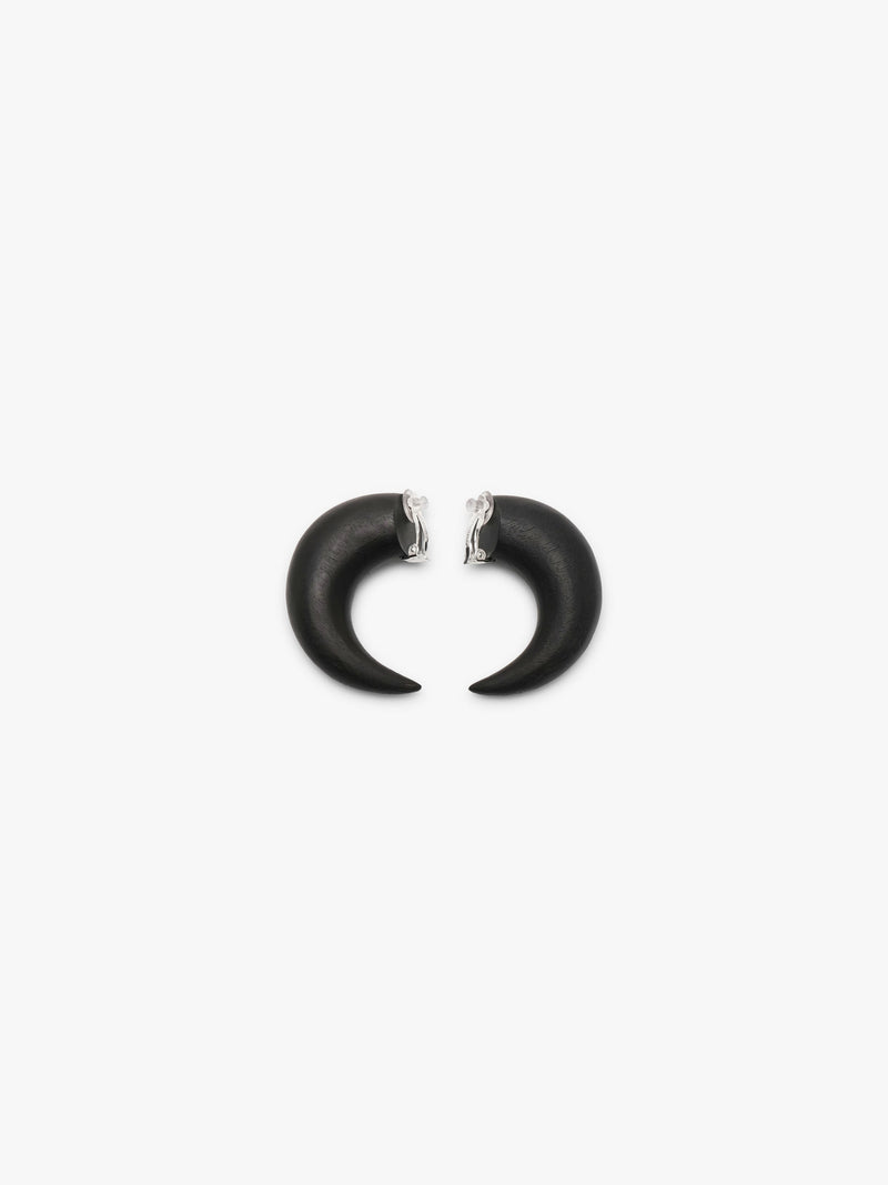 A pair of matte black earrings shown against a solid white background.