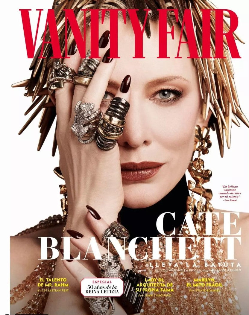 Vanity Fair magazine cover featuring a woman with jewelry and text