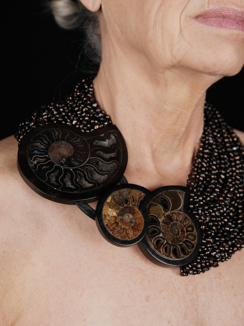 Necklace: amonite, ebony, pearls, leather