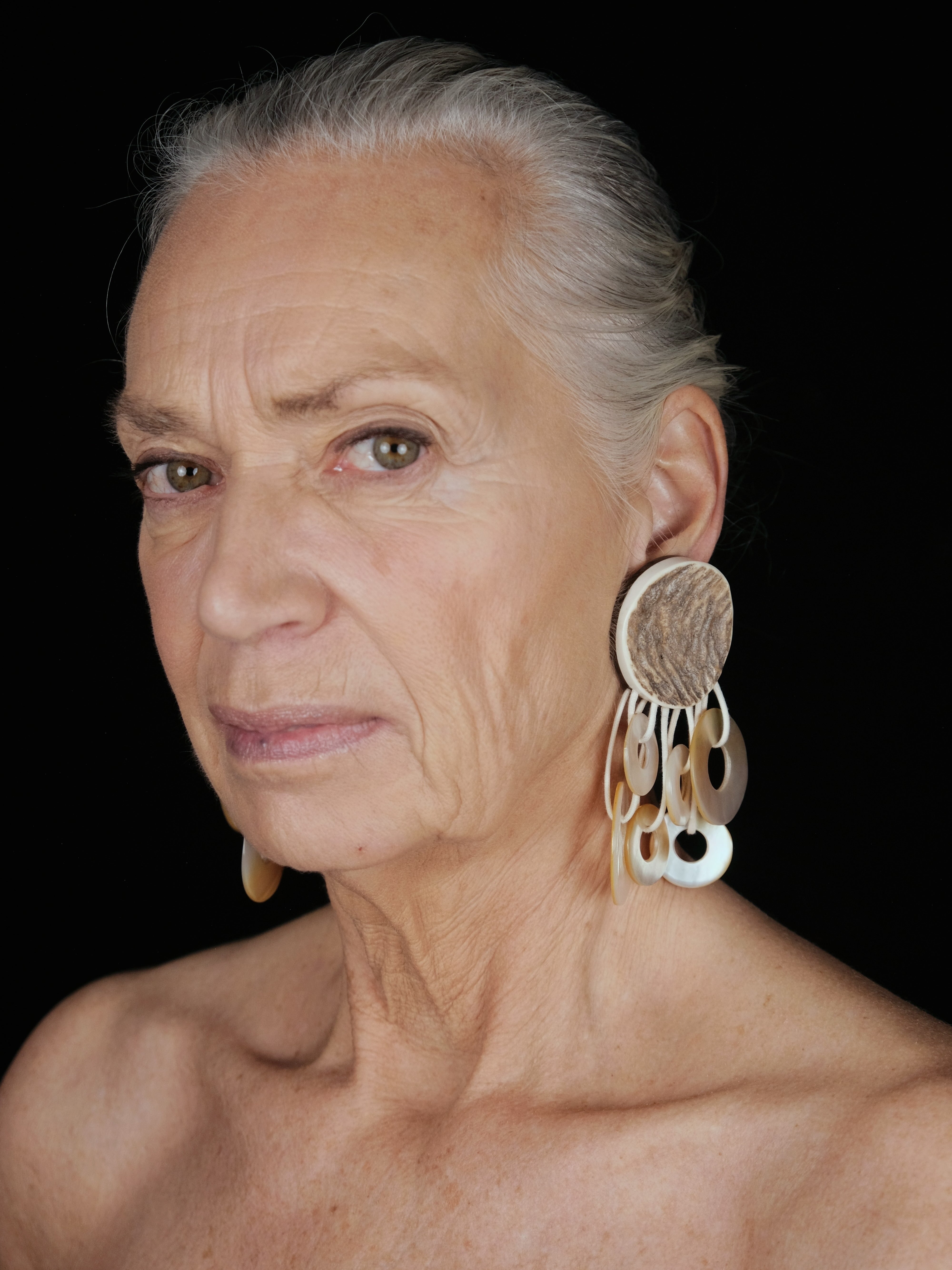 Earrings: mother of pearl, antler, bog oak,