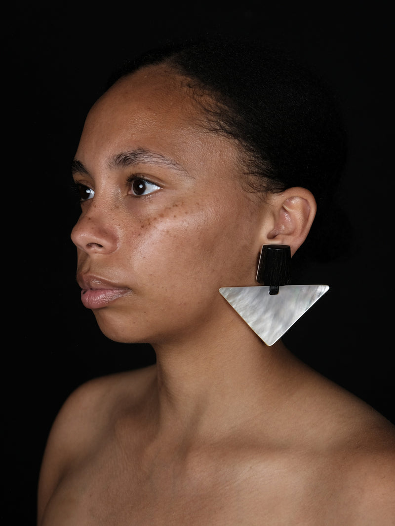 Earrings: buffalo horn, mother of pearl, bone