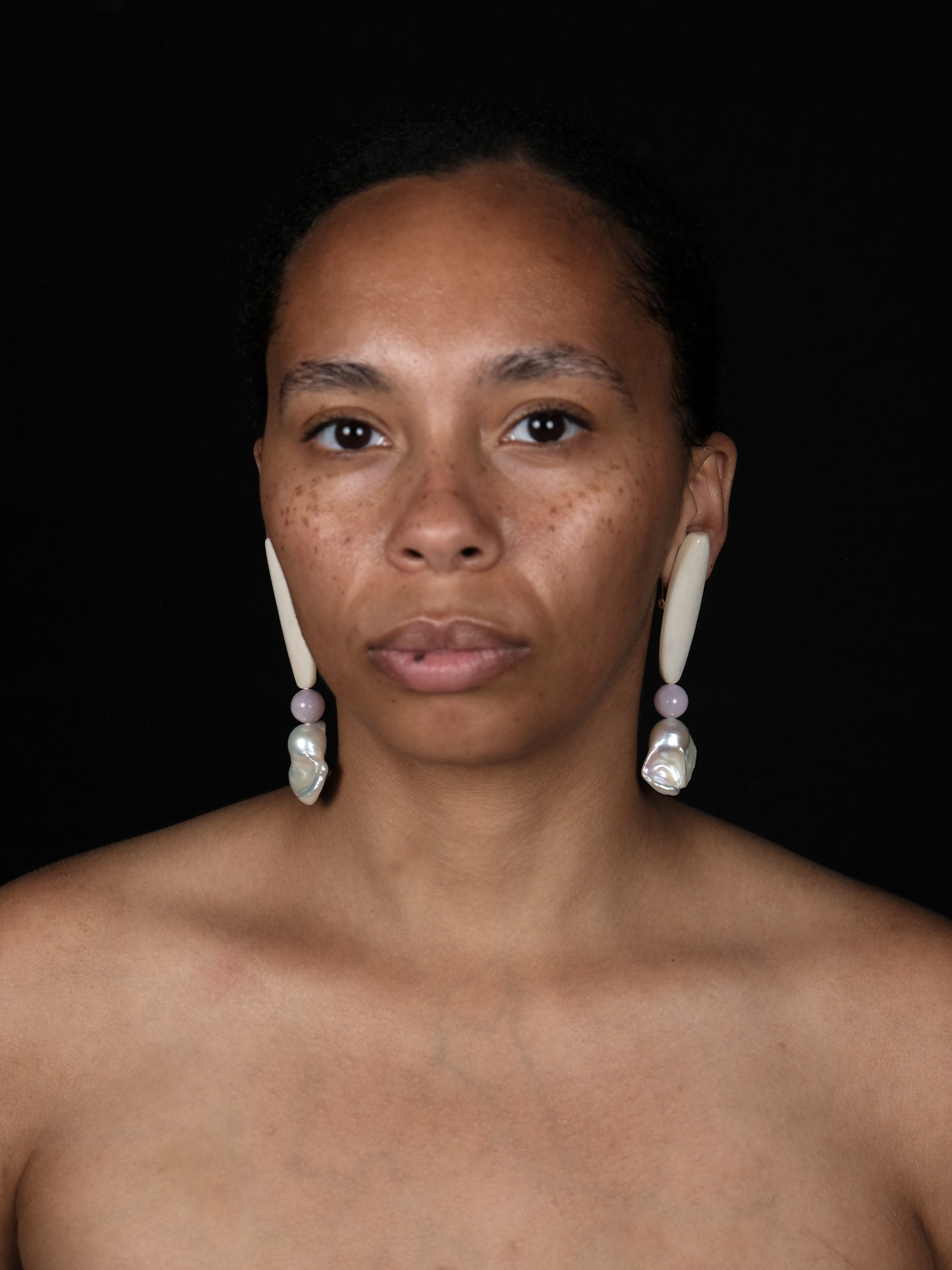 Earrings: bone, baroque pearl, rose quartz