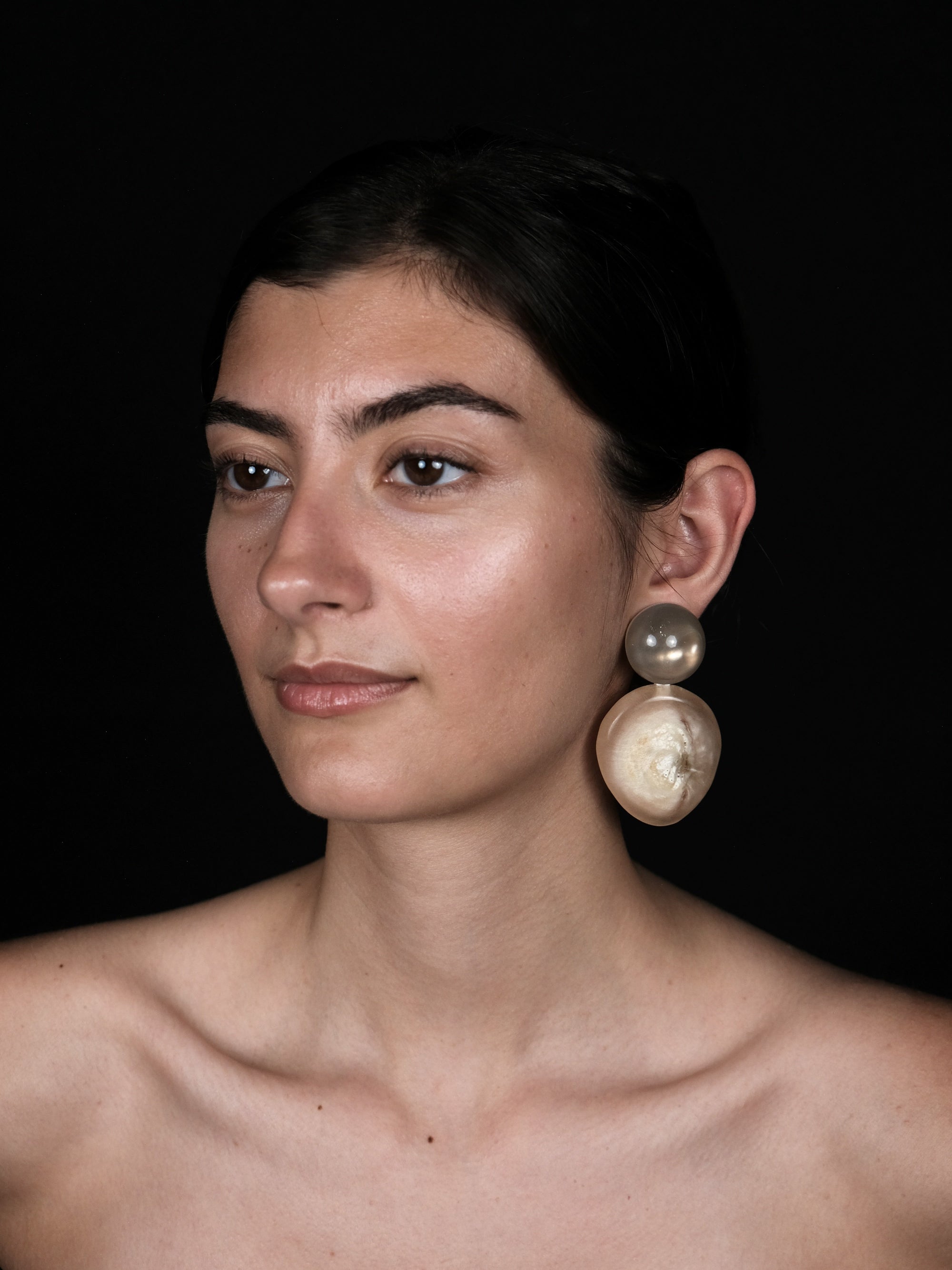 Earrings: citrine, mother of pearl, musk ox horn