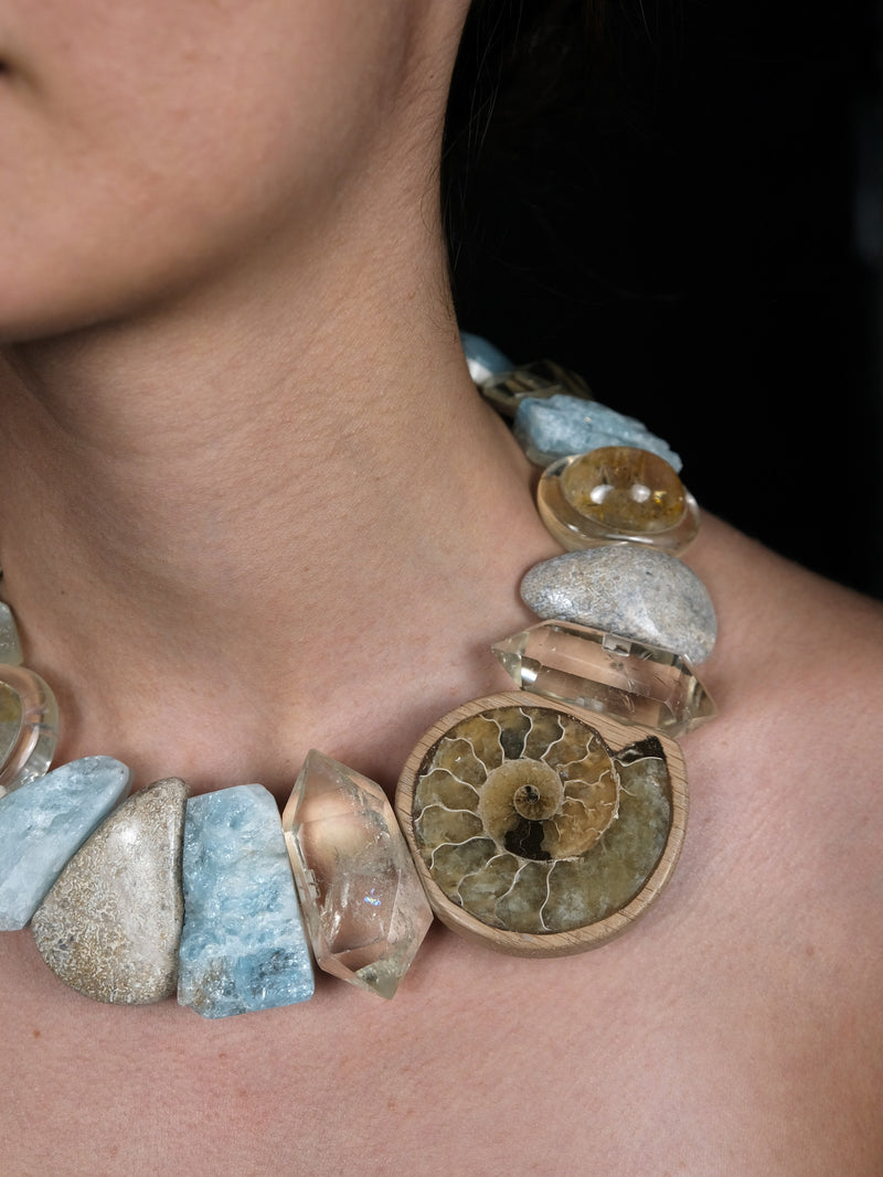 Necklace: aquamarine, ammonite, petrified dinosaur bone, citrine, fluorite, quartz