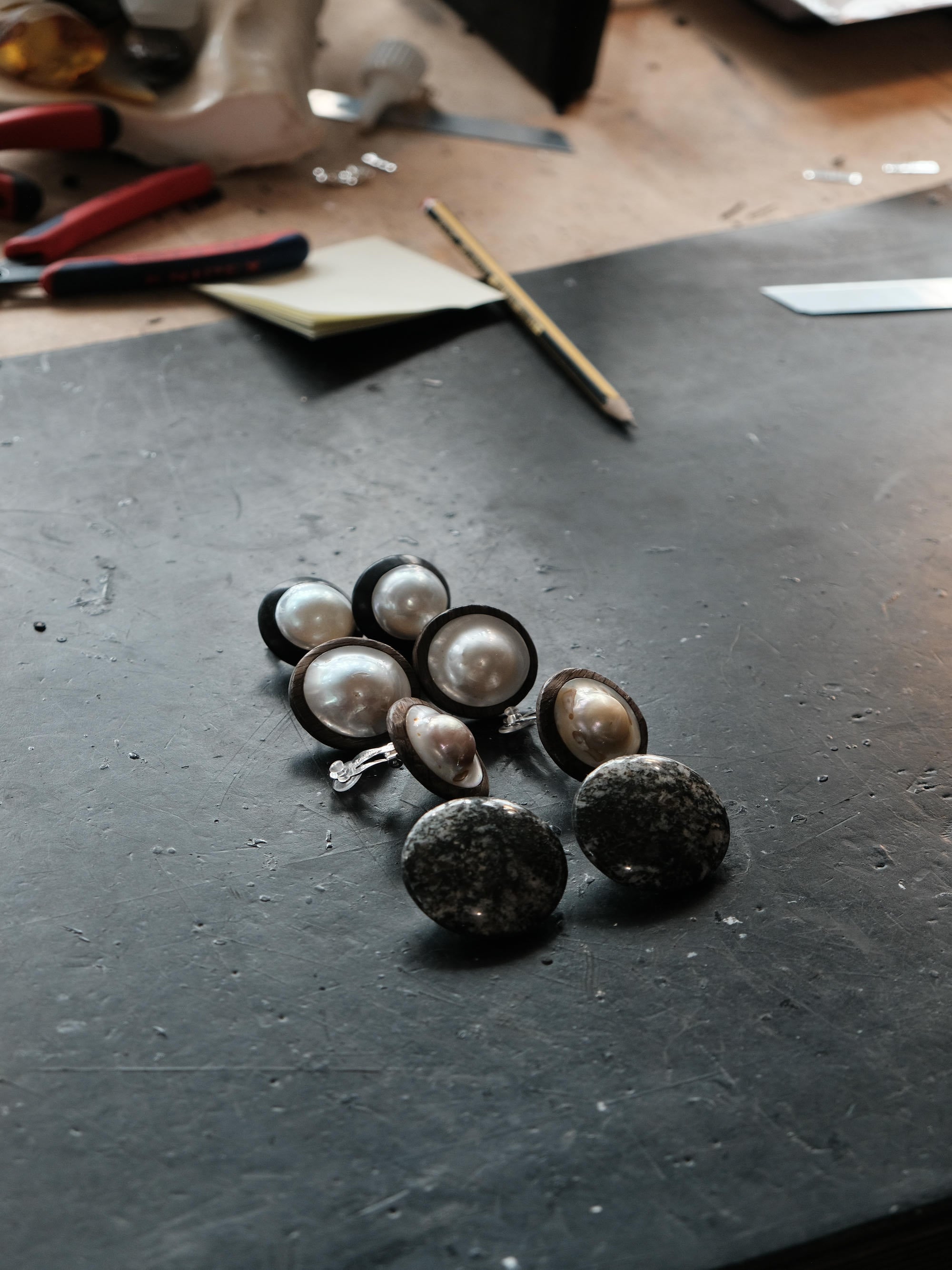 Earrings: baroque pearls, ebony