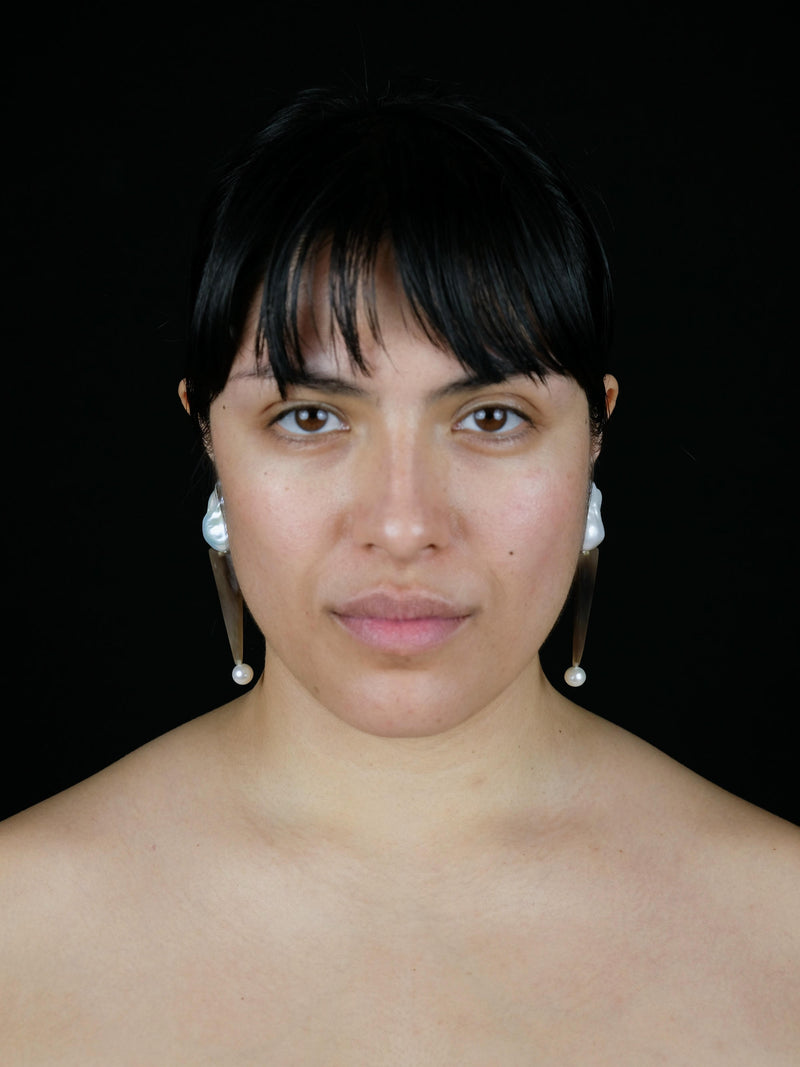 Earrings: baroque pearl, horn