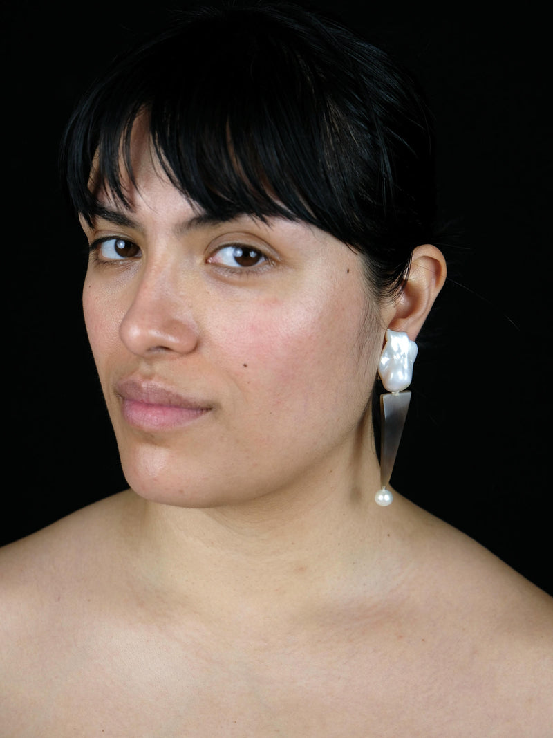 Earrings: baroque pearl, horn