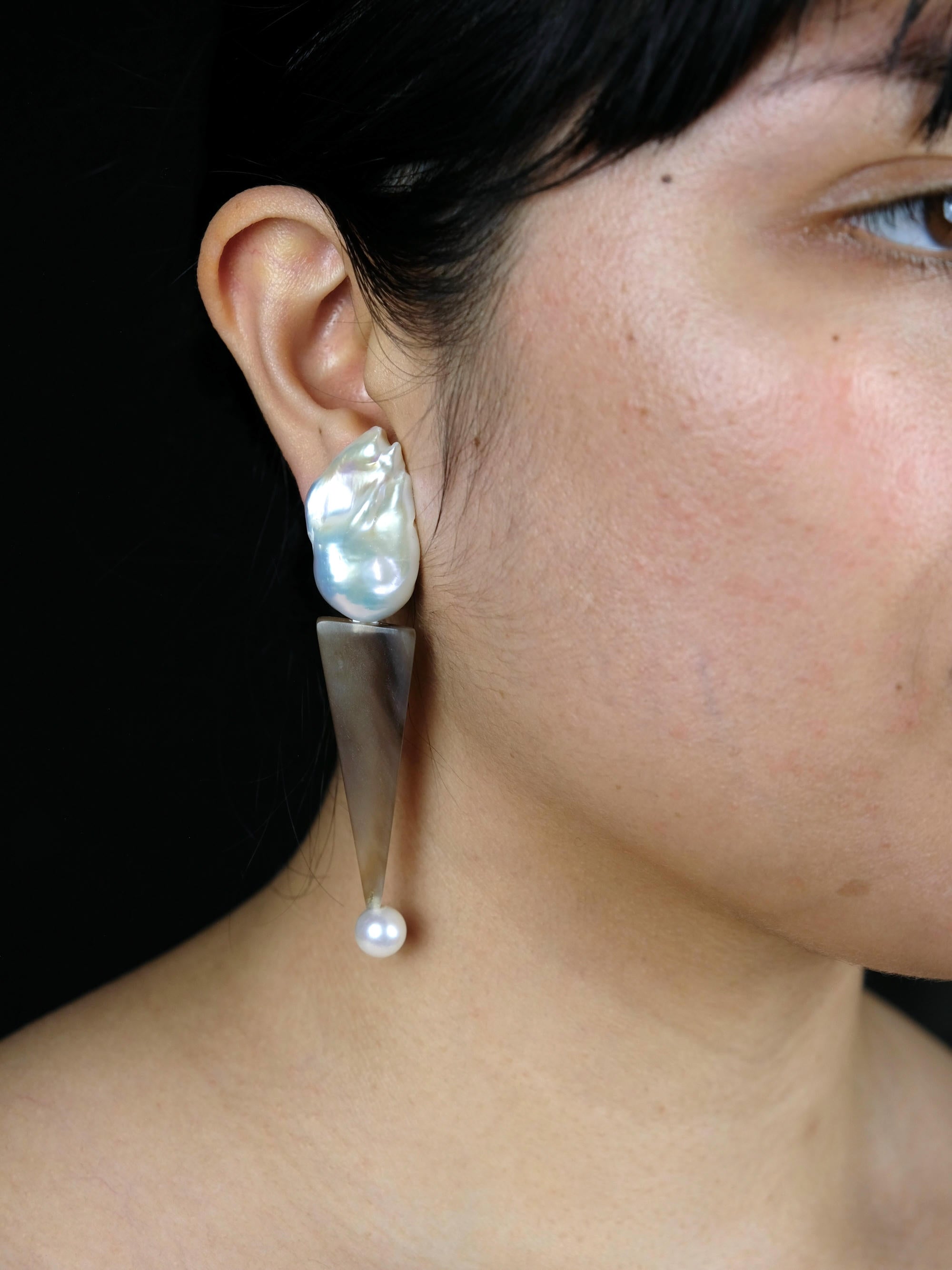 Earrings: baroque pearl, horn