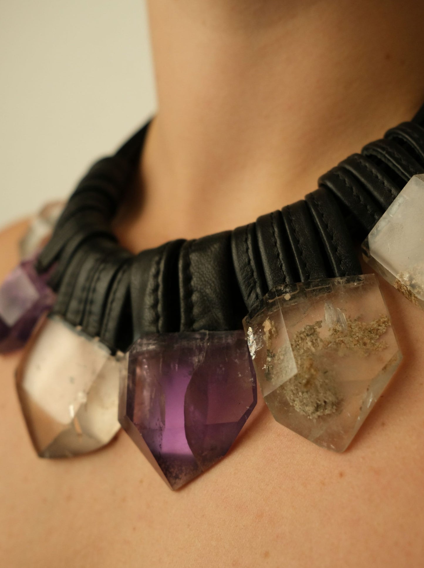 Necklace: mountain crystal, leather, rutilated quartz