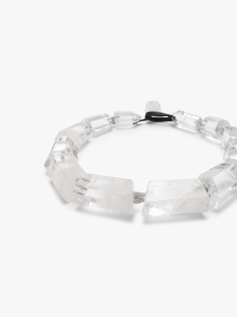 Mountain crystal necklace on white background