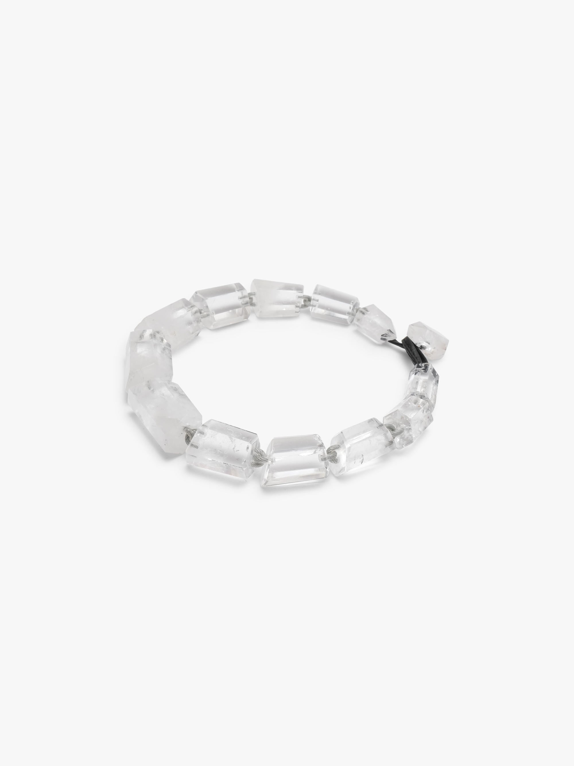 Mountain crystal necklace on white background